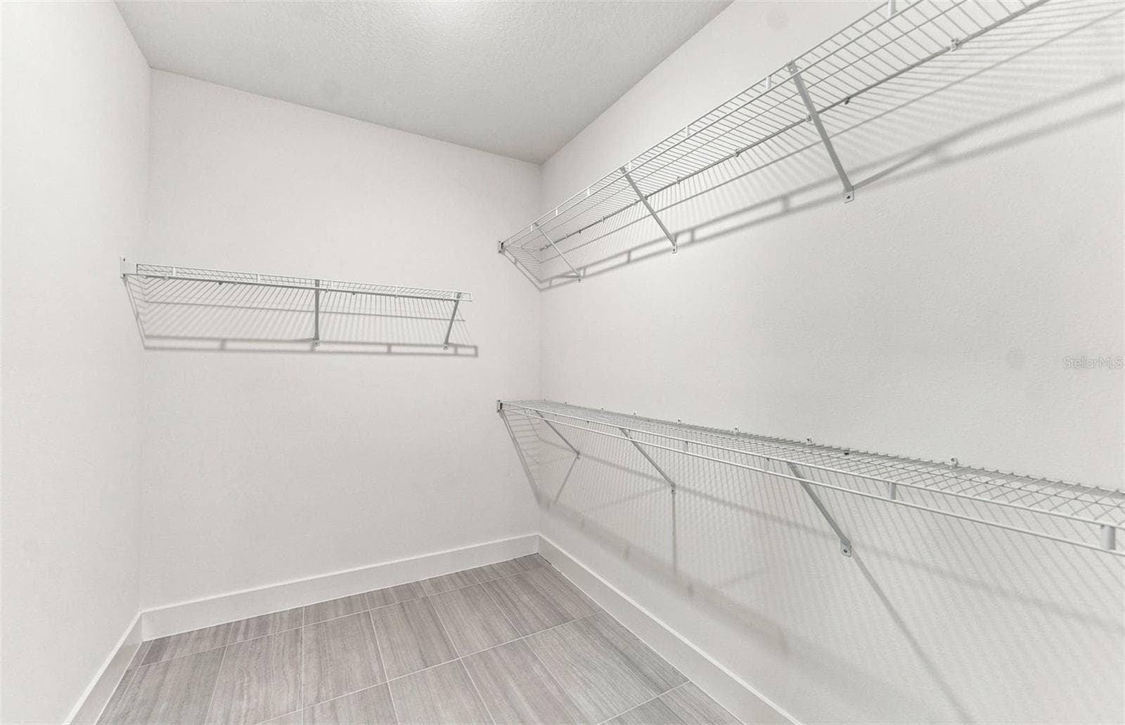 Owner's Walk-in Closet - 35224 COHAGEN TRL, ZEPHYRHILLS