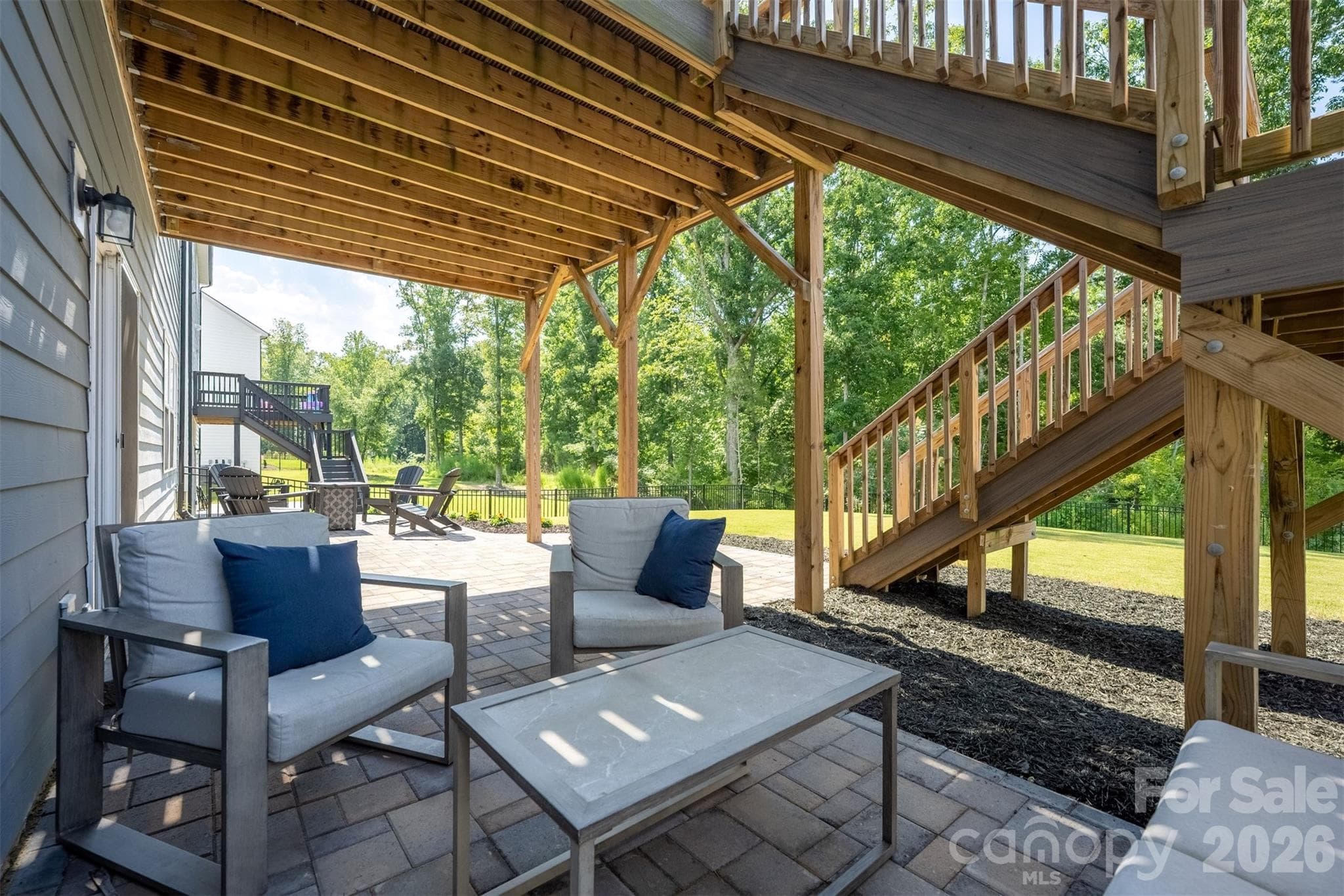 Covered patio beneath the deck - 4320 Tournette Drive, Indian Land