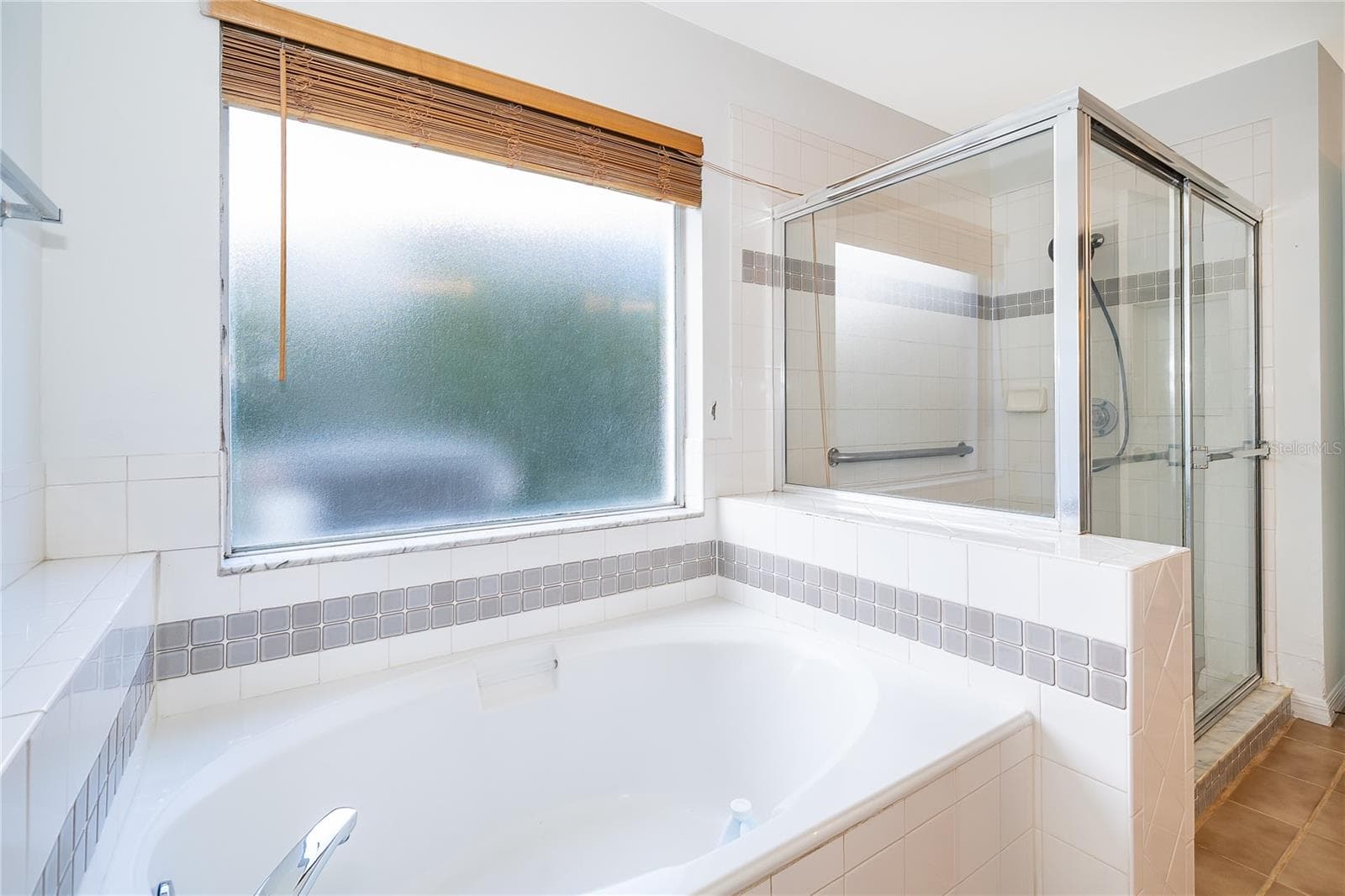 Garden Tub and Seperate Shower in the Primary Bath - 696 REMINGTON OAK DR, LAKE MARY