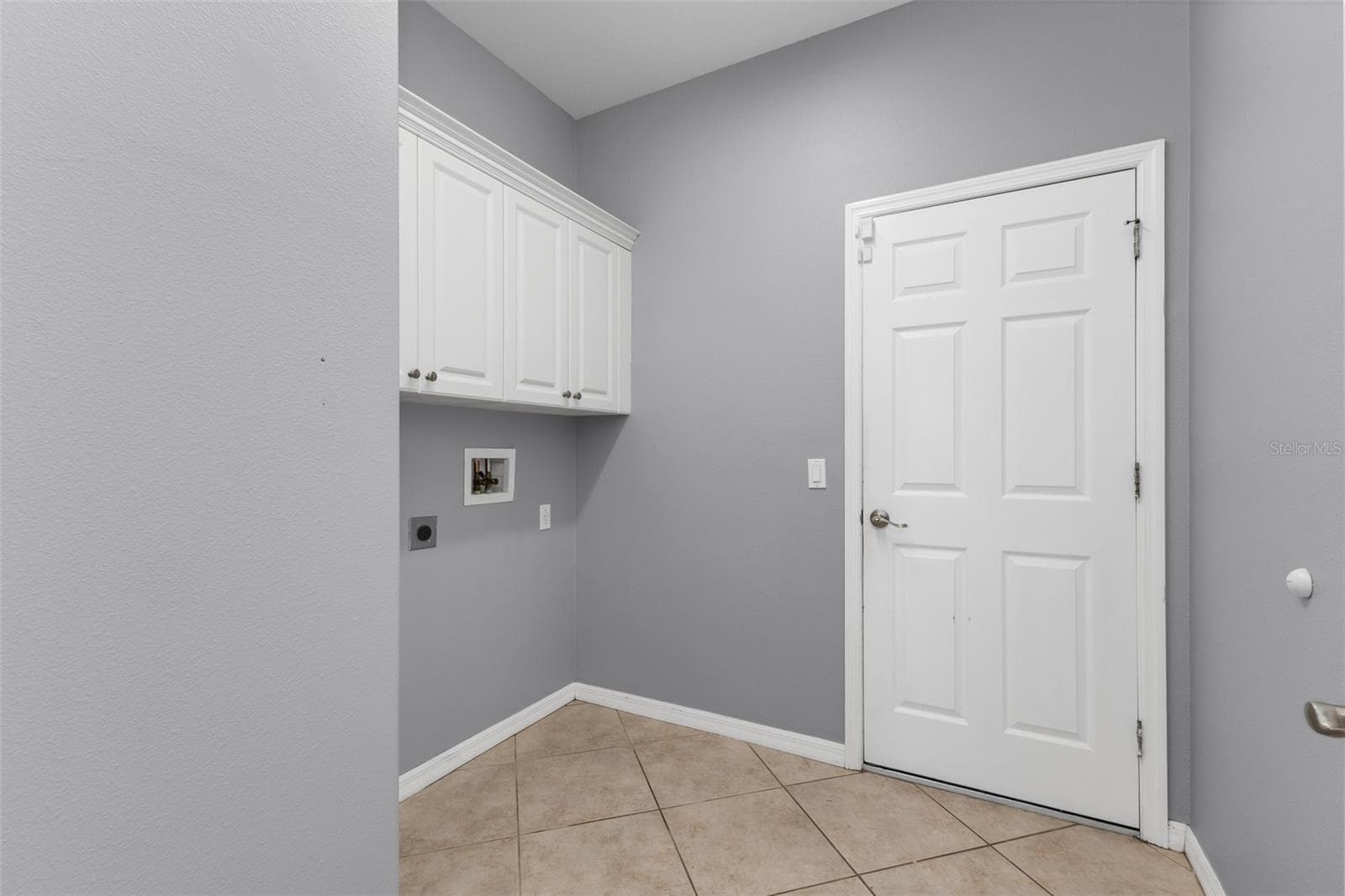 Laundry room with extra cabinets. - 2739 ATWATER DR, NORTH PORT