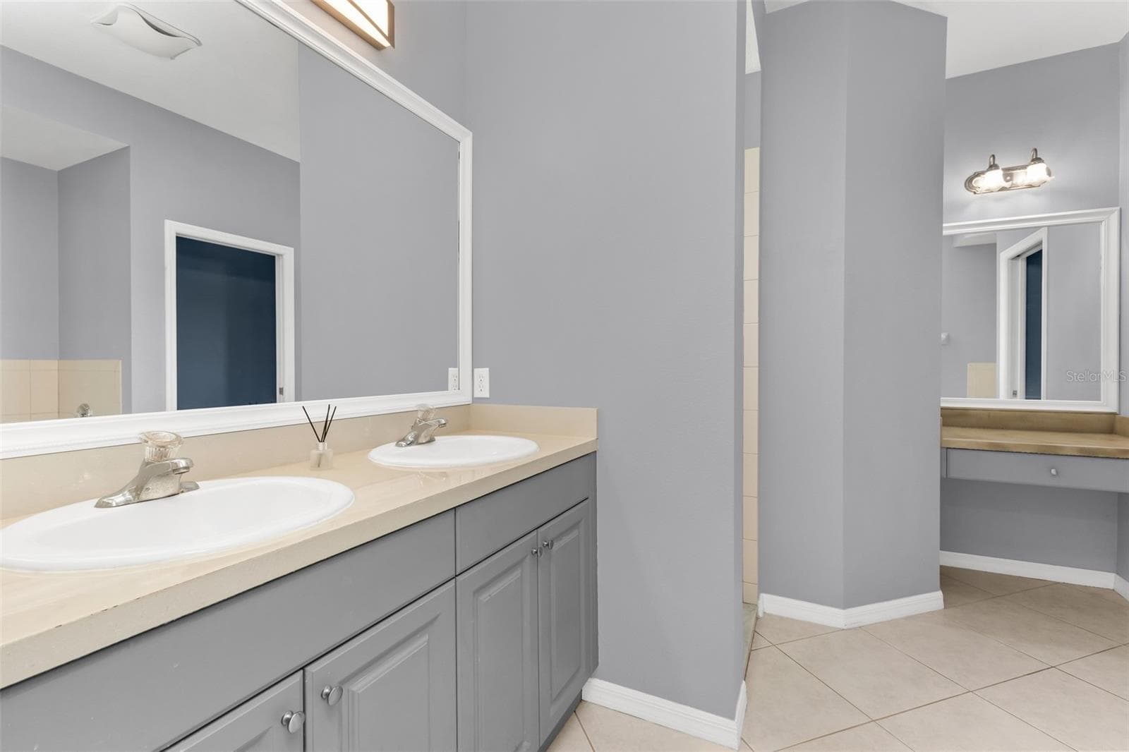 Primary bathroom features dual sinks, walk-in-shower, and garden tub. - 2739 ATWATER DR, NORTH PORT