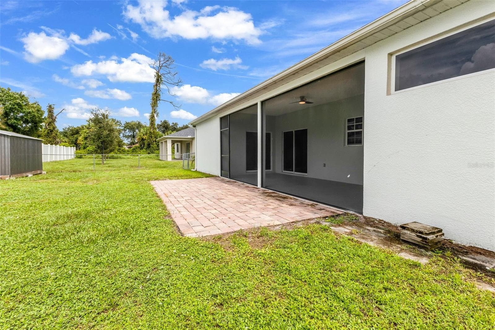 Added paver lanai perfect for grilling. - 2739 ATWATER DR, NORTH PORT