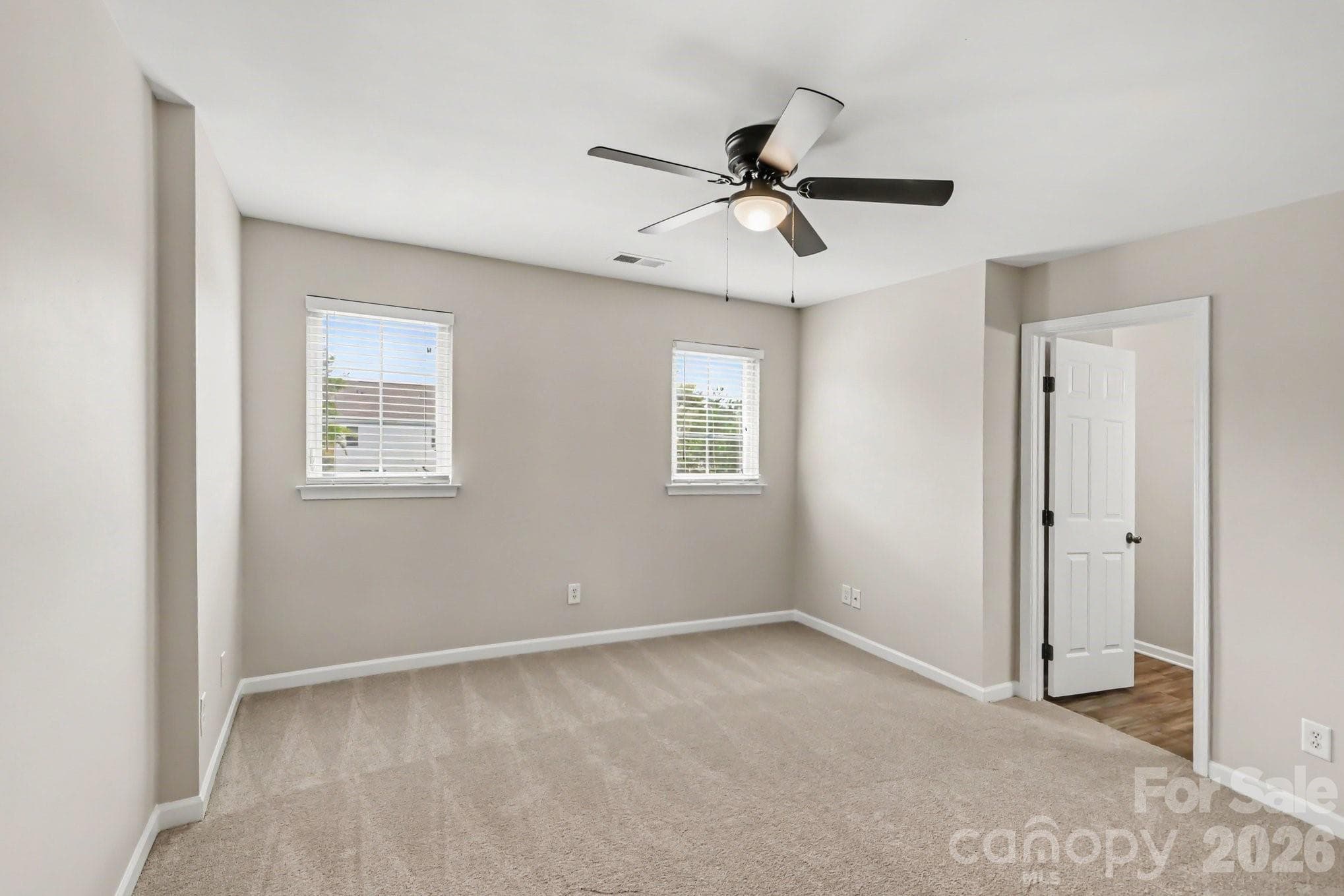 Unstaged primary bedroom - 4960 Sunburst Lane, Charlotte
