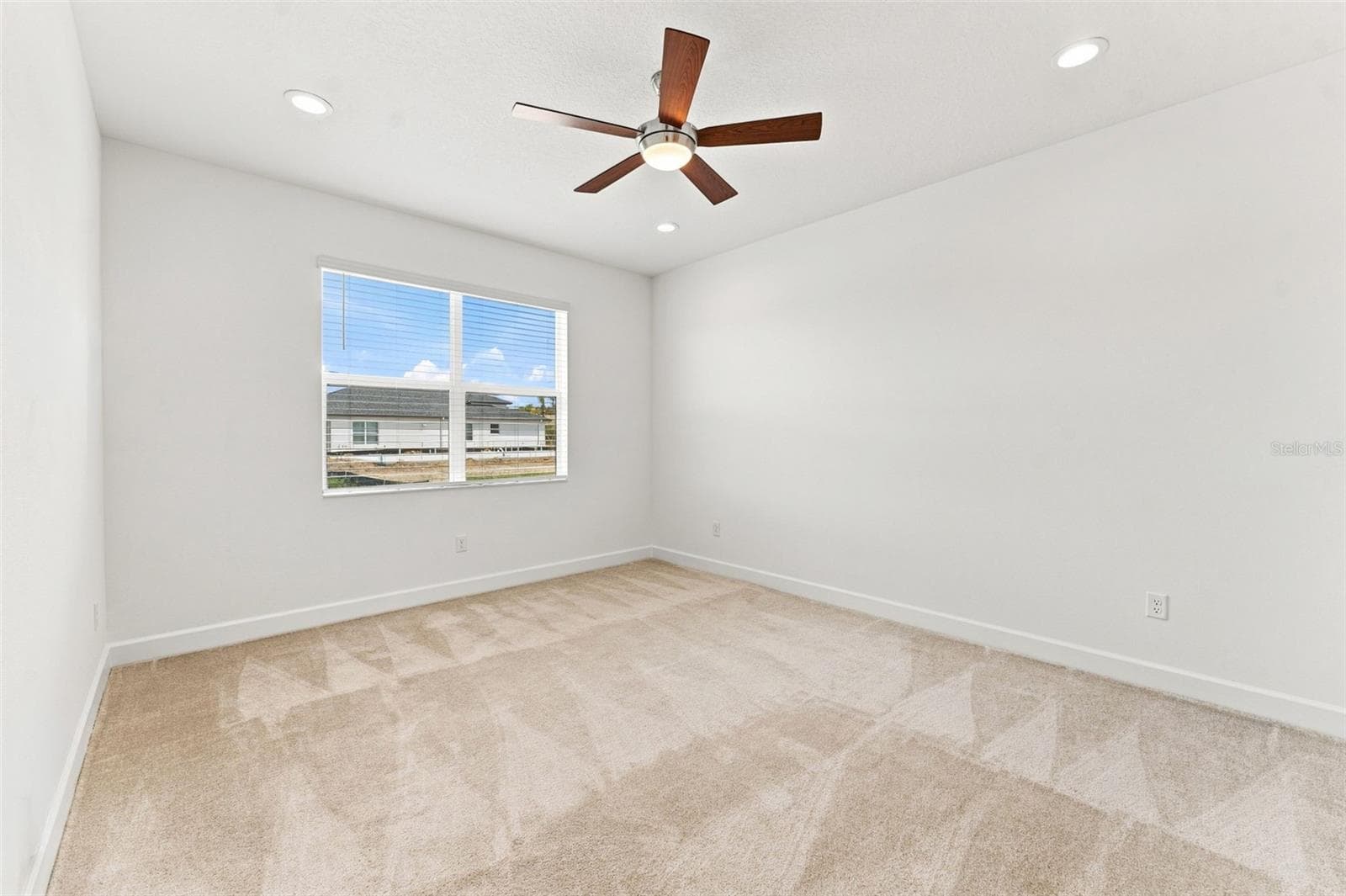 Primary Bedroom With Recessed Lighting & Ceiling Fan - 3427 MALTA AVE, WESLEY CHAPEL