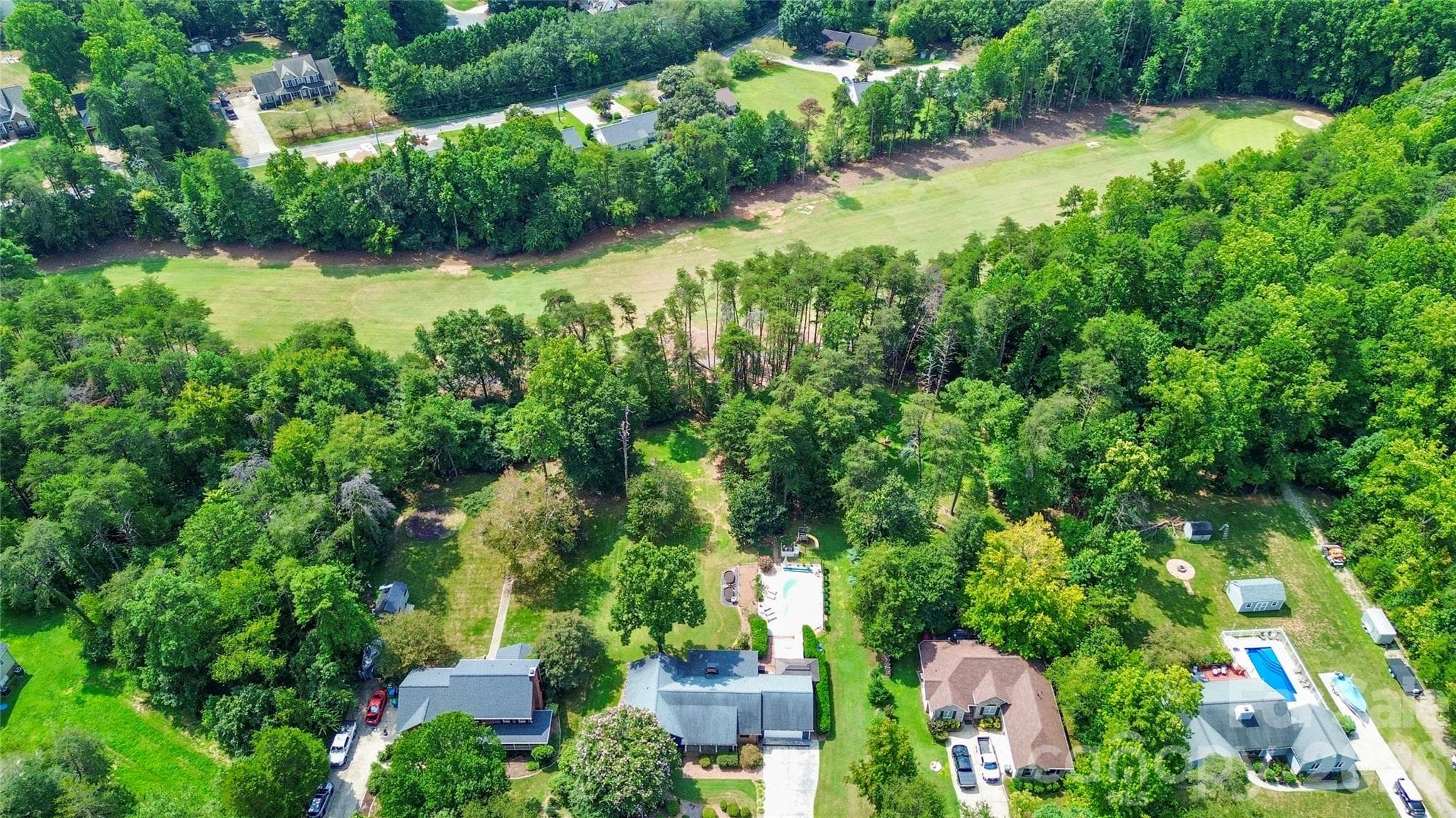 Home sits on a golf course, but still offers abundant privacy. - 127 Fairway Drive, Mooresville