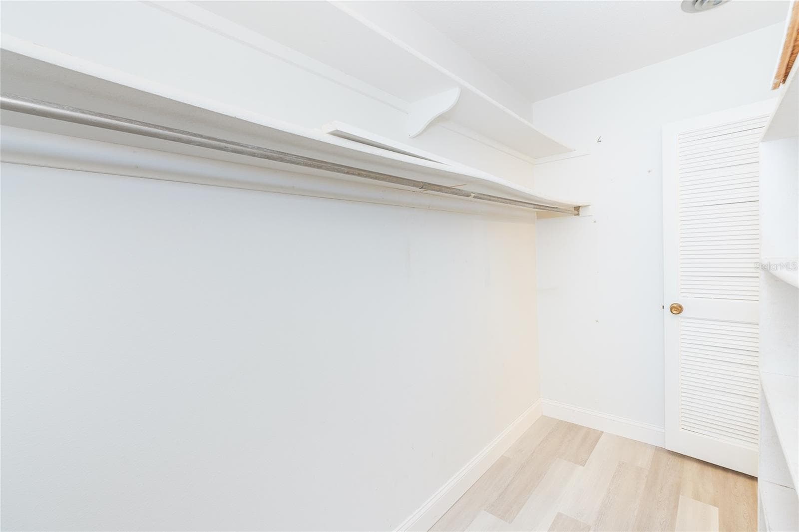 Primary bedroom walk in closet - 995 BAY VISTA BLVD, ENGLEWOOD