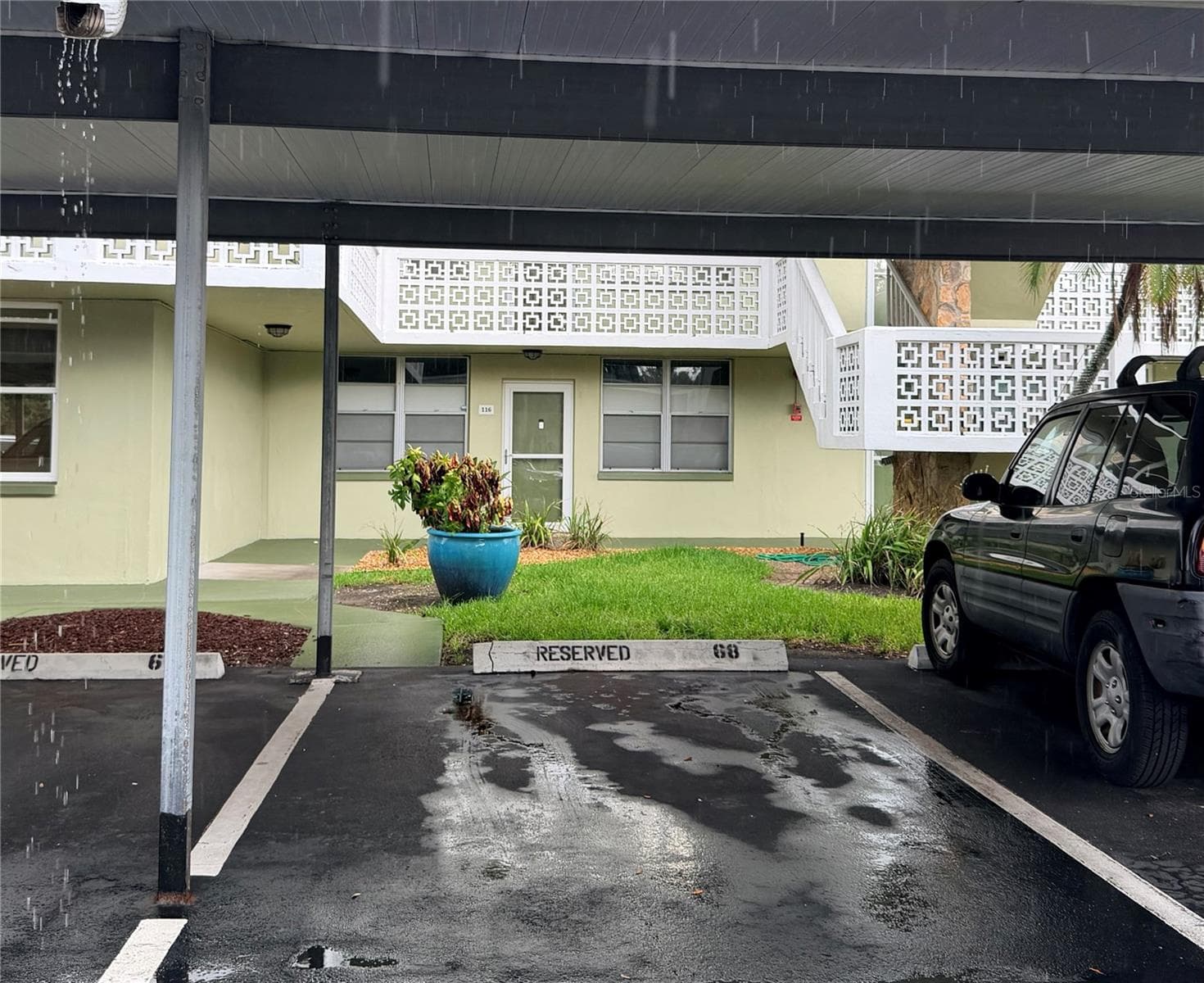 Assigned covered space almost directly in front of Unit - 4885 1ST ST NE #117, ST PETERSBURG