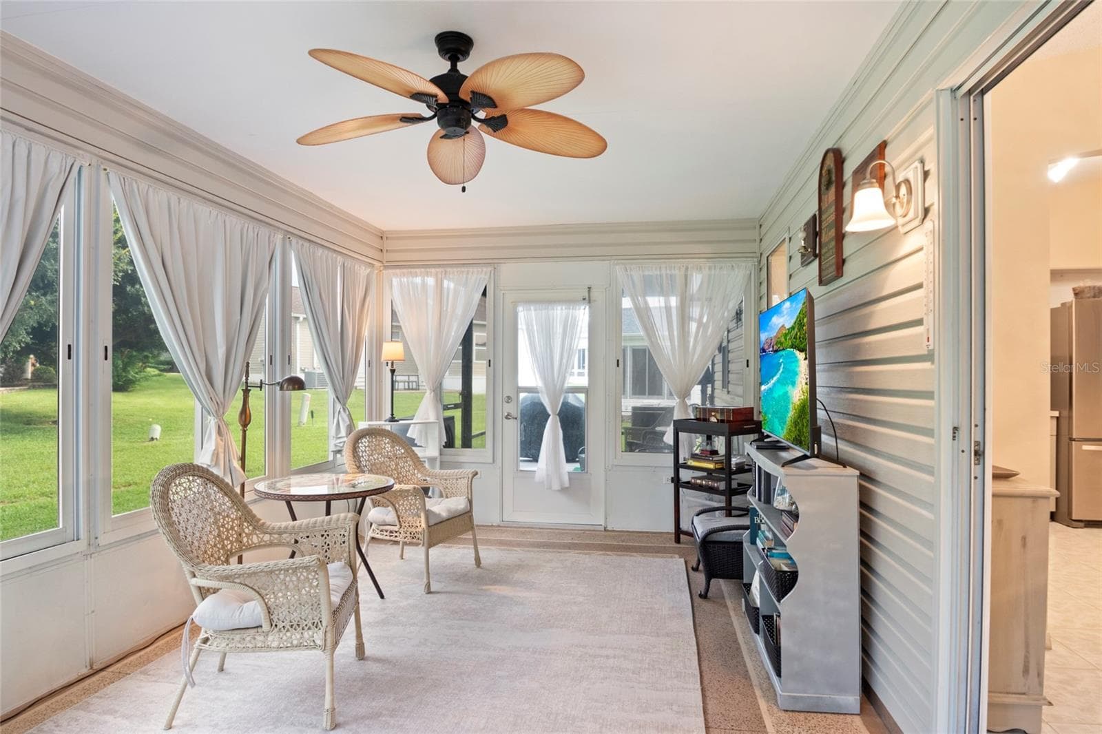 Specious Florida Room, painted concrete flooring. - 672 SAN PEDRO DR, THE VILLAGES