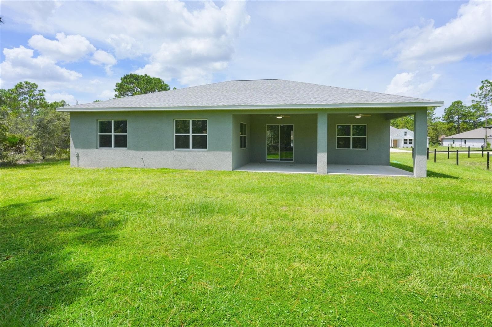 Rear Exterior - 17460 MACASSAR RD, WEEKI WACHEE
