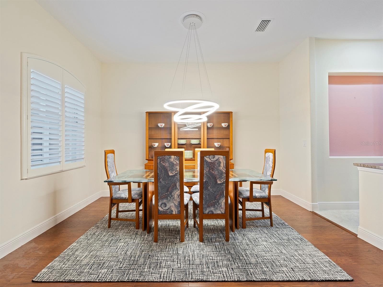 Dining w/plantation shutters - 8348 BRIDGEPORT BAY CIR, MOUNT DORA