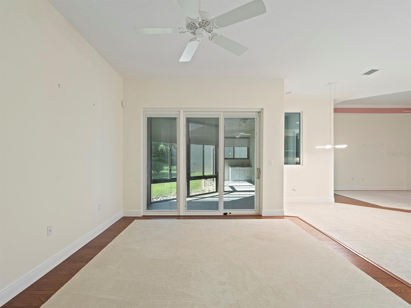 Vacant Family Room - 8348 BRIDGEPORT BAY CIR, MOUNT DORA