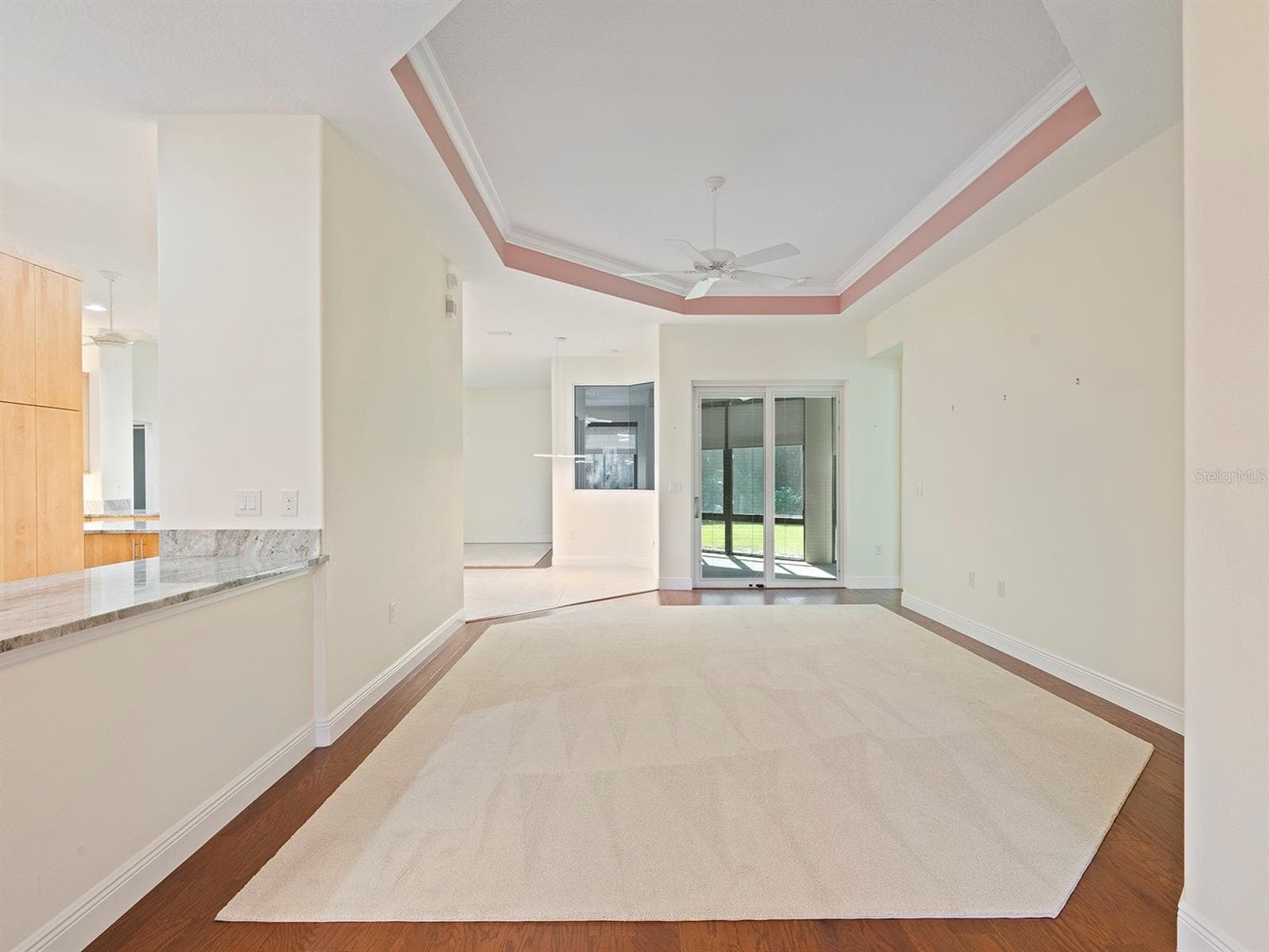 Now vacant living room and butler pantry - 8348 BRIDGEPORT BAY CIR, MOUNT DORA