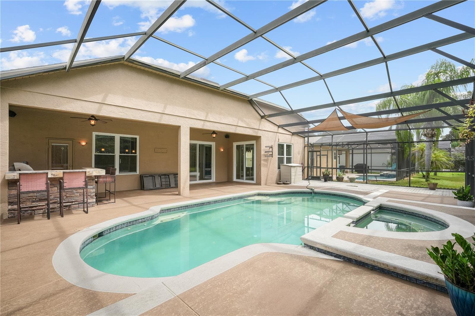 Pool and hot tub - 10169 MARSH PINE CIR, ORLANDO