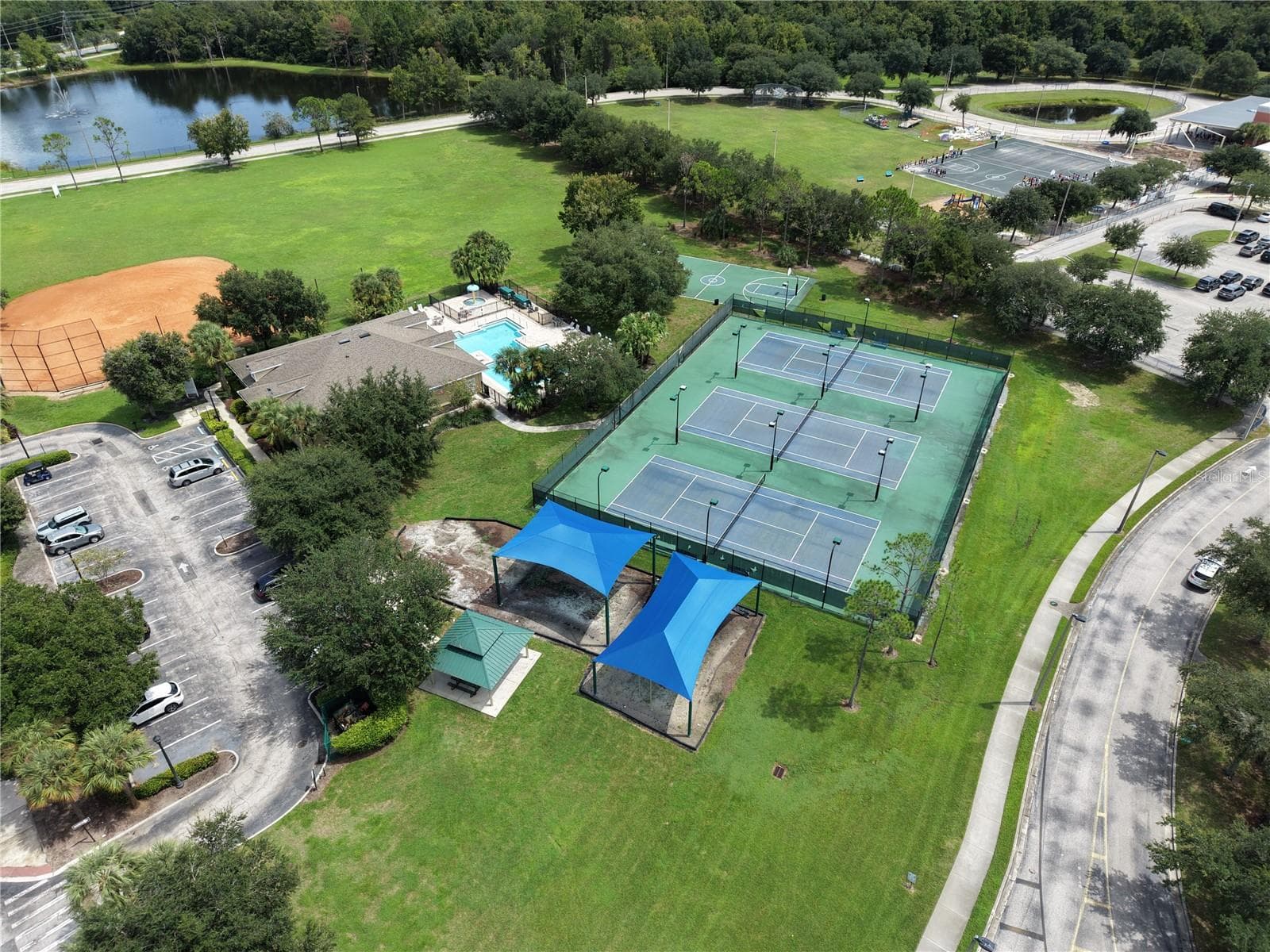 Club house with tennis,pickleball,basketball and fitness - 10169 MARSH PINE CIR, ORLANDO