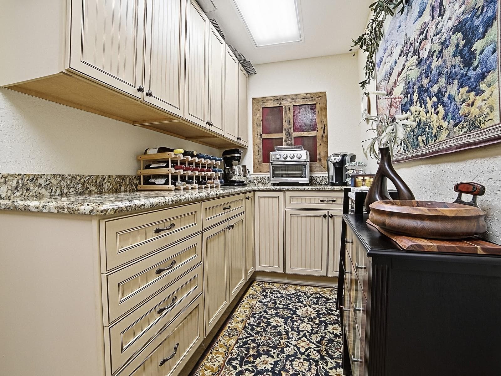 ADDITIONAL CABINET SPACE IN THE LAUNDRY ROOM - 1089 VANCE TRL, THE VILLAGES