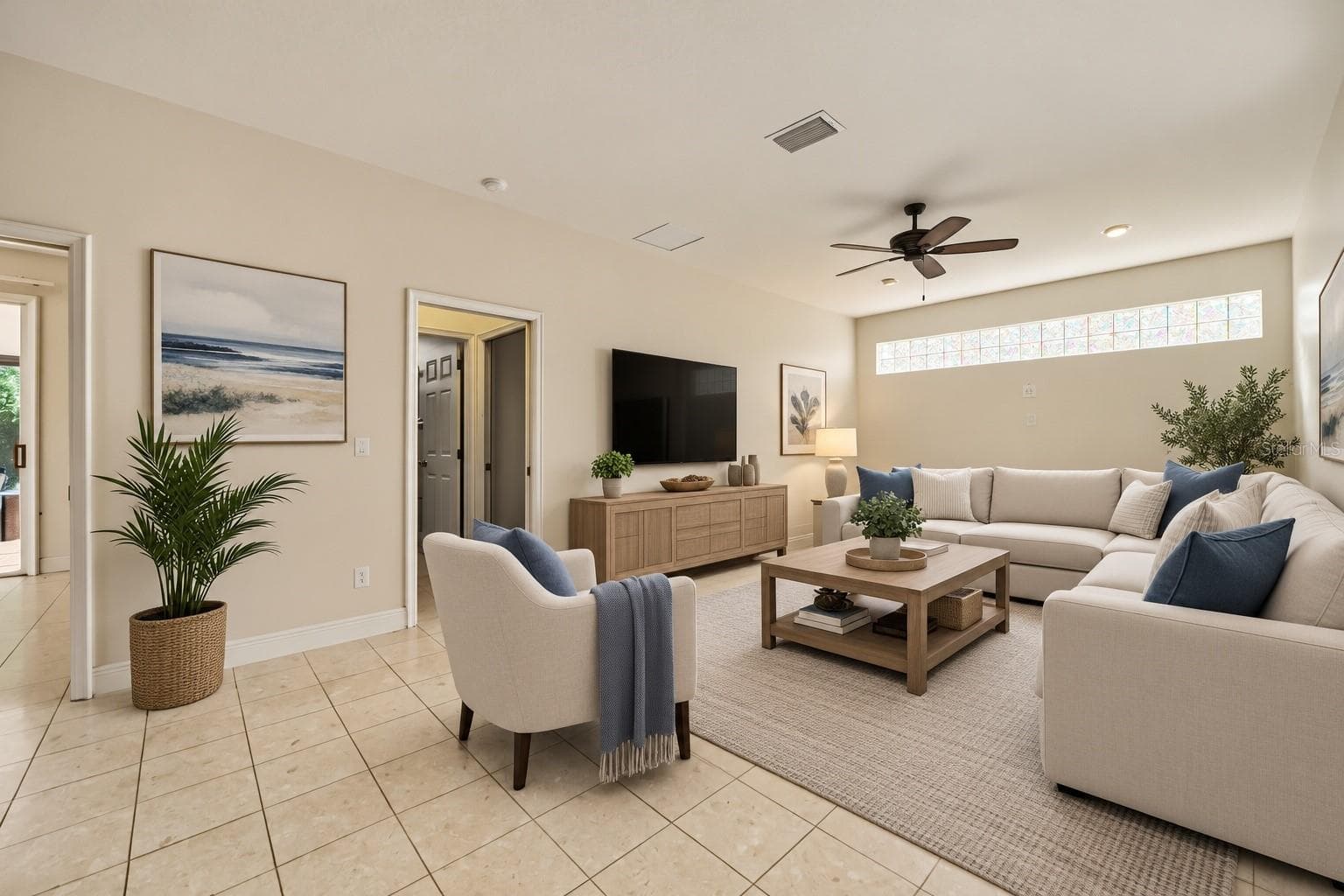 Family room virtual stage - 122 SOPHIA MARIE CV, SANFORD