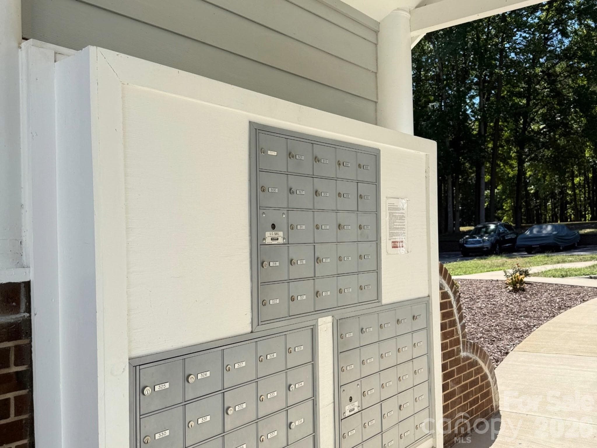 mailbox tree right beside your building - 327 Northwest Drive, Davidson