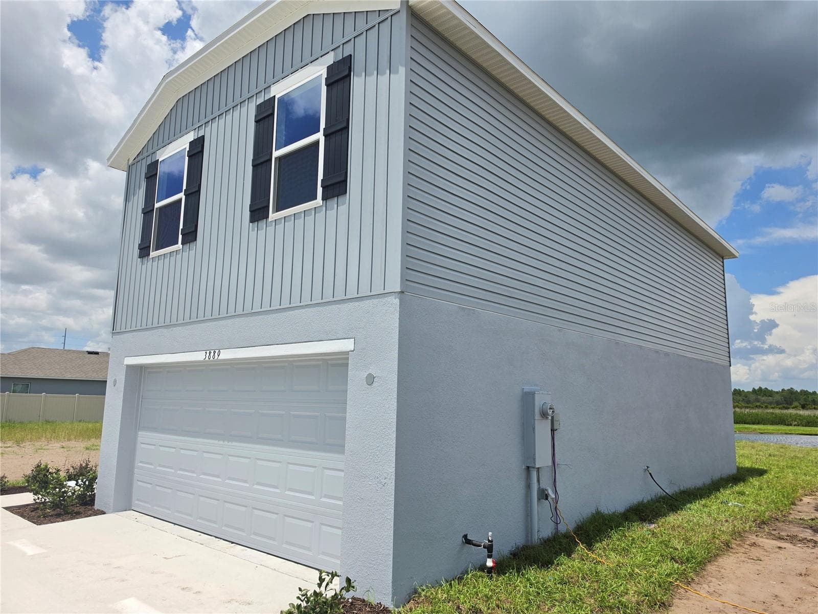 2 car garage - 3889 BLUETHREAD WAY, POINCIANA