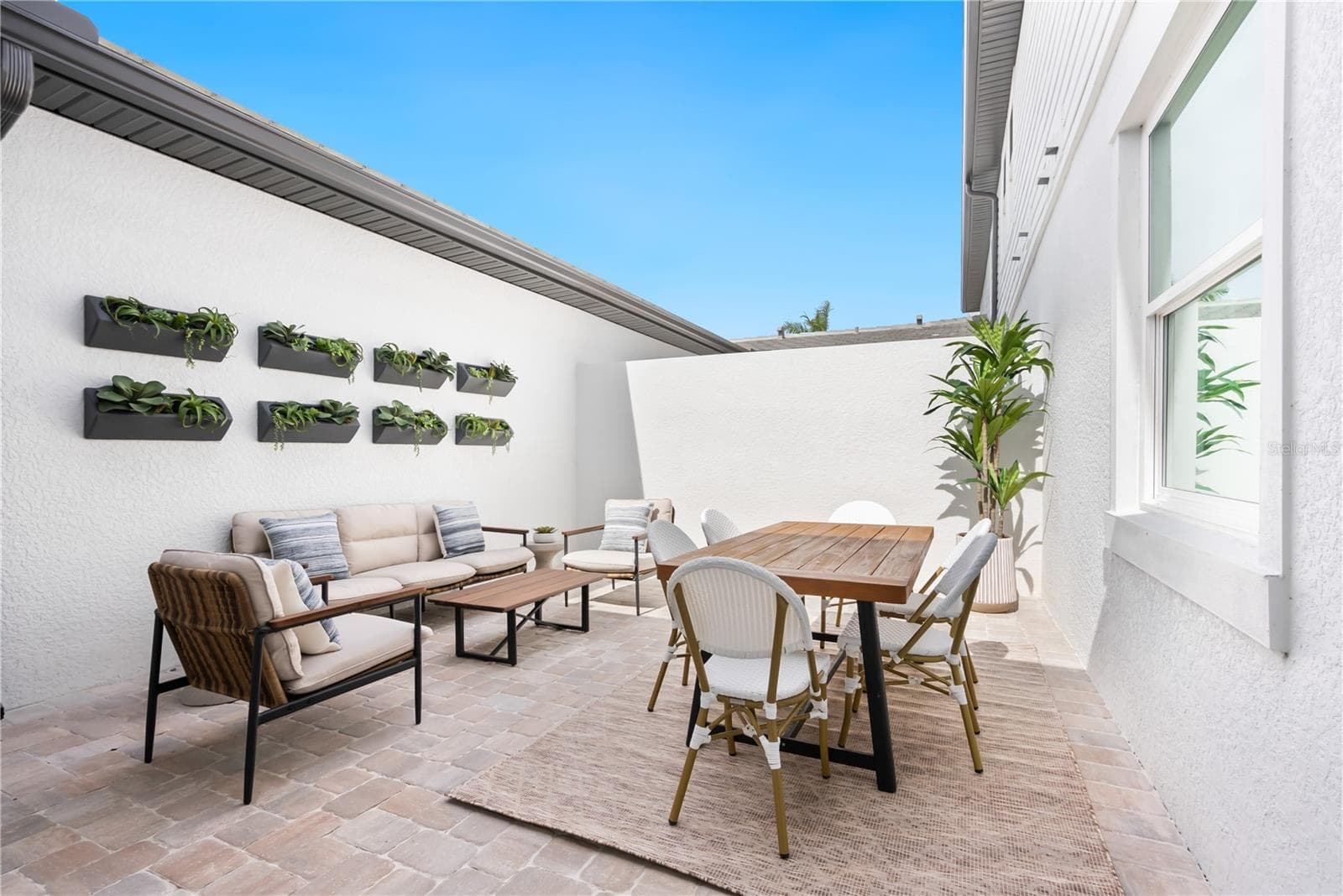 Courtyard:Photo description represents the model home of same floor plan. - 17836 BROADLEAF LOOP, VENICE