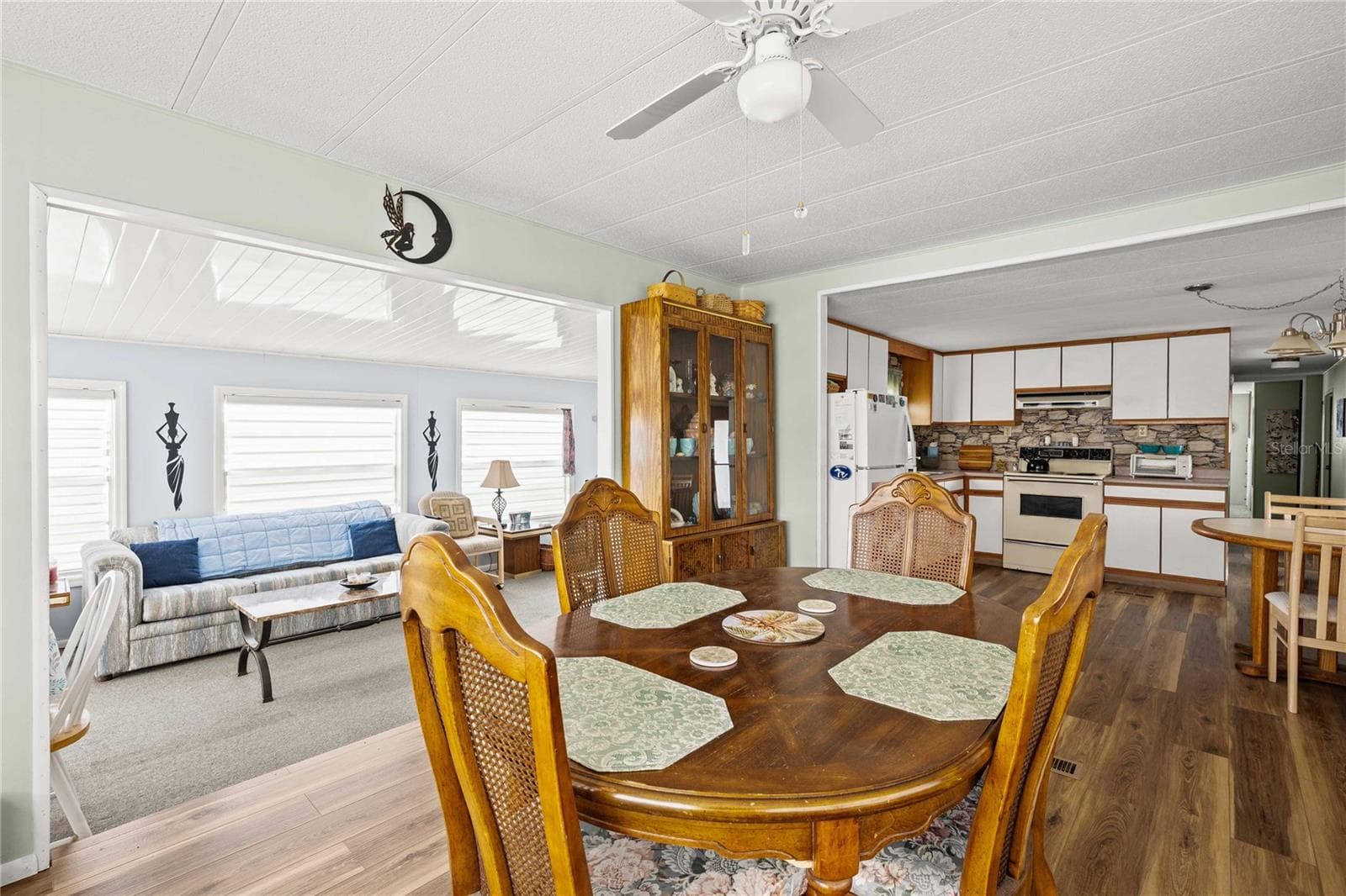 And, the dining space opens to the kitchen - 36917 GRACE AVE, ZEPHYRHILLS