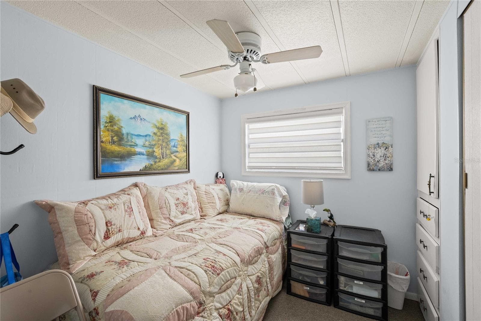 The guest bedroom has a day bed and is very cozy - 36917 GRACE AVE, ZEPHYRHILLS