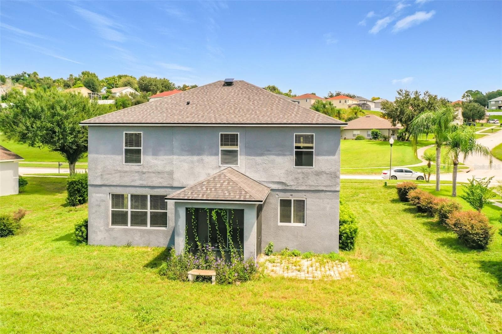 Rear of home from the lake side - 852 N JACKS LAKE RD, CLERMONT