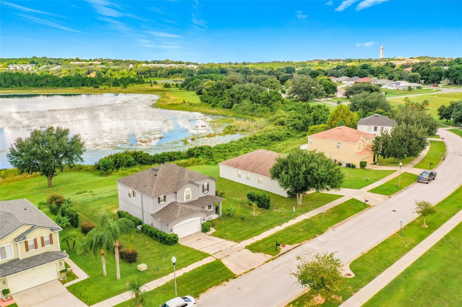 Aerial view of the home with Jacks Lake - 852 N JACKS LAKE RD, CLERMONT