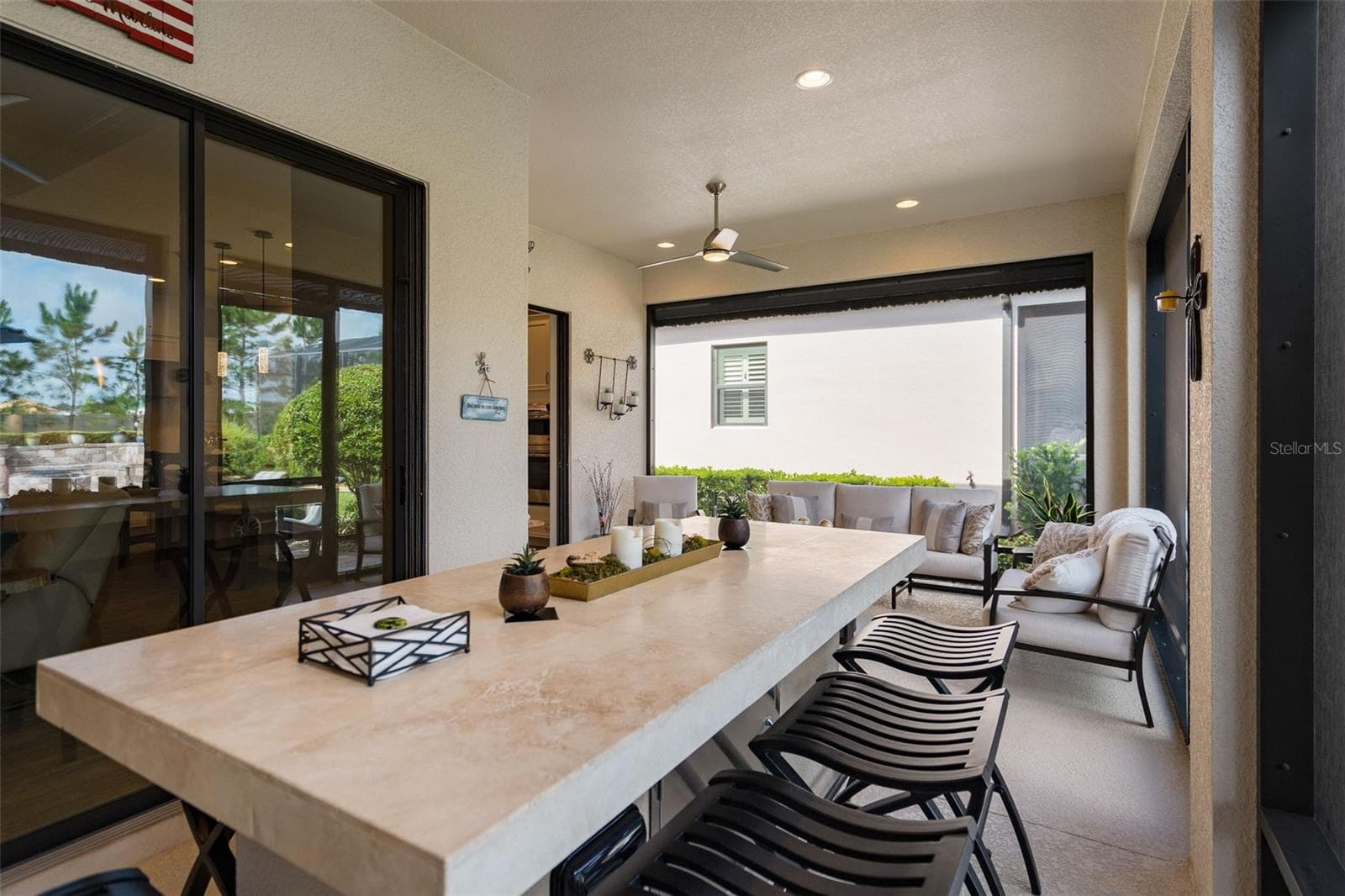 A built-in dining area complete with music. - 1279 ZEEK RIDGE ST, CLERMONT