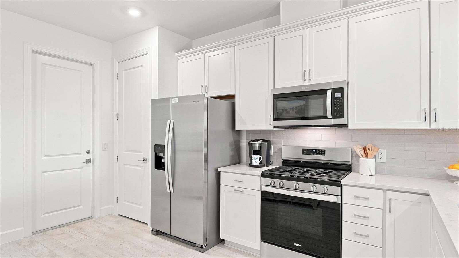Kitchen connect to the garage - 14229 EAGLE BRANCH DR, NOKOMIS