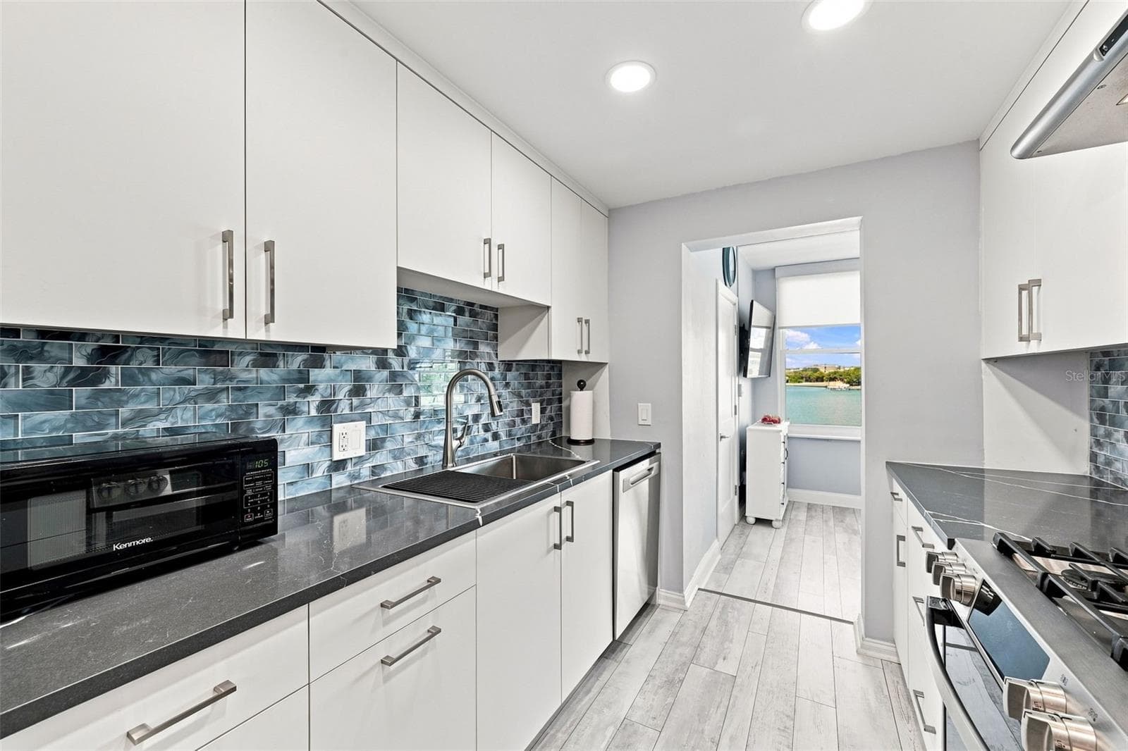 Galley style kitchen, with the view! - 1898 SHORE DR S #208, SOUTH PASADENA