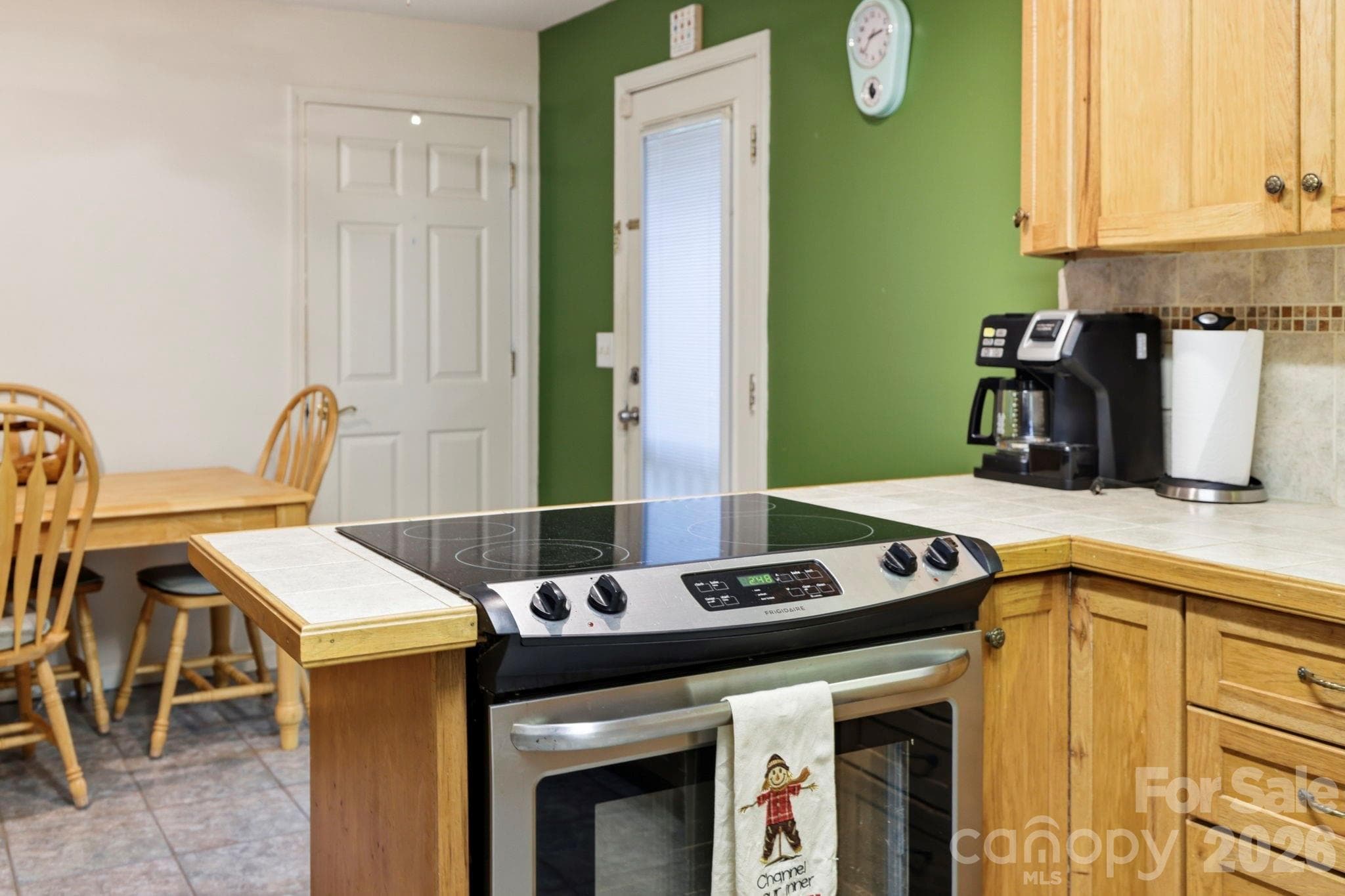 Cooktop, dining area, back door - 10687 Cruso Road, Canton
