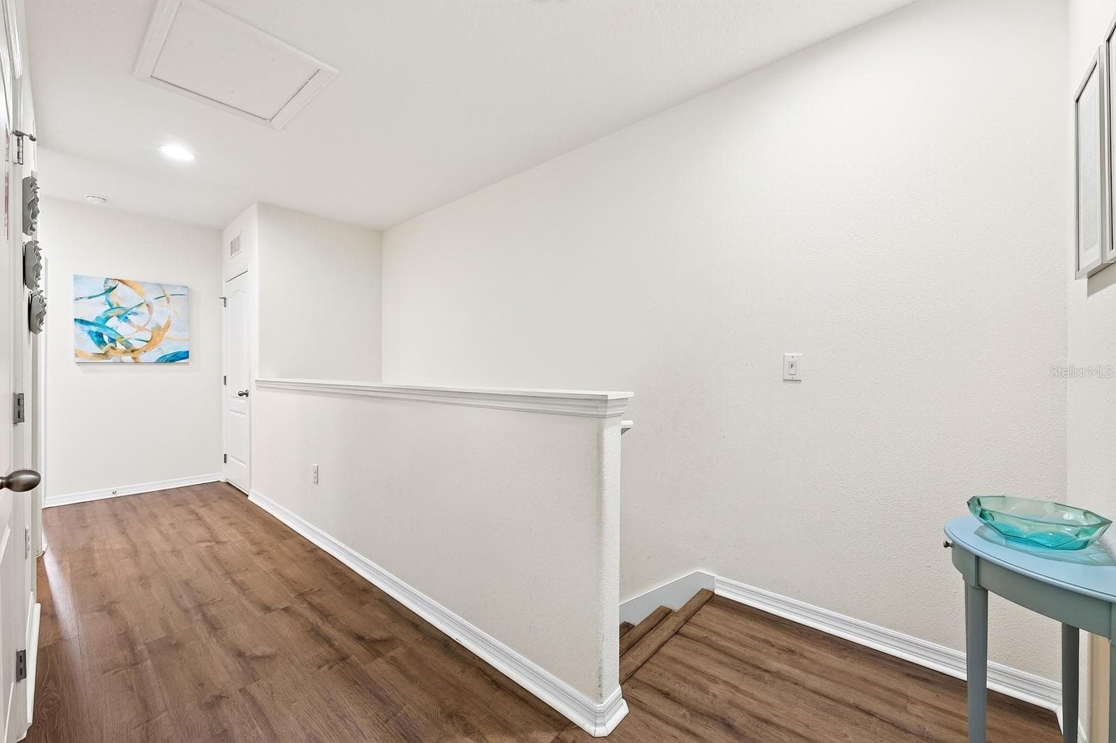 Upstairs, NEW LAMINATE FLOORING installed in 2023, runs throughout the second floor. - 4722 TERRASONESTA DR, DAVENPORT
