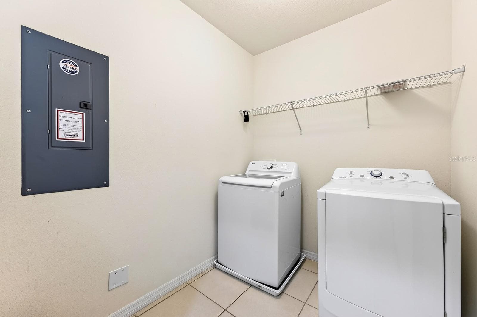 The conveniently located Laundry Room completes the second floor. - 4722 TERRASONESTA DR, DAVENPORT