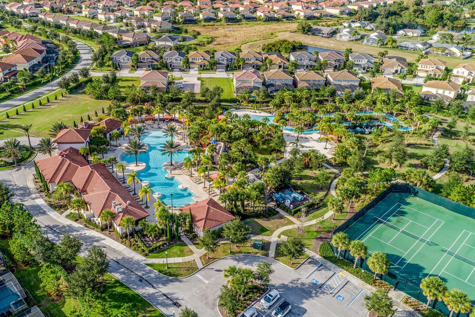 Solterra residents and guests enjoy an impressive collection of AMENITIES designed to make every day feel like vacation, including a RESORT-STYLE HEATED POOL, waterslide, lazy river, fitness center, CAFÉ, playground and tennis, pickleball and volleyball courts. - 4722 TERRASONESTA DR, DAVENPORT