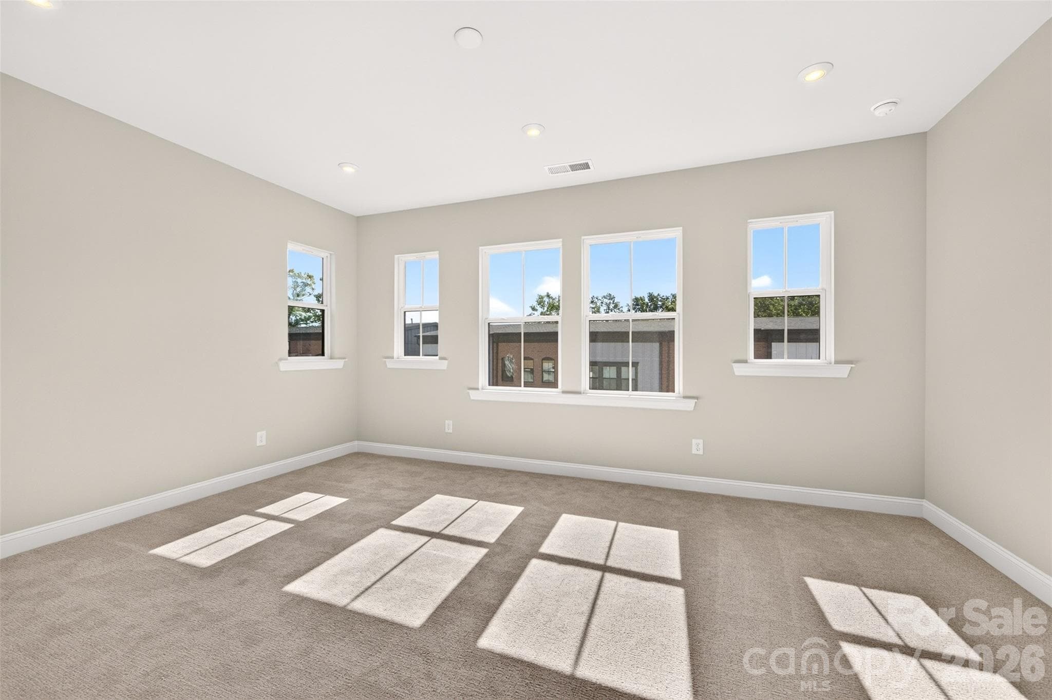 Light filled primary bedroom - 411 Old Town Village Road, Waxhaw