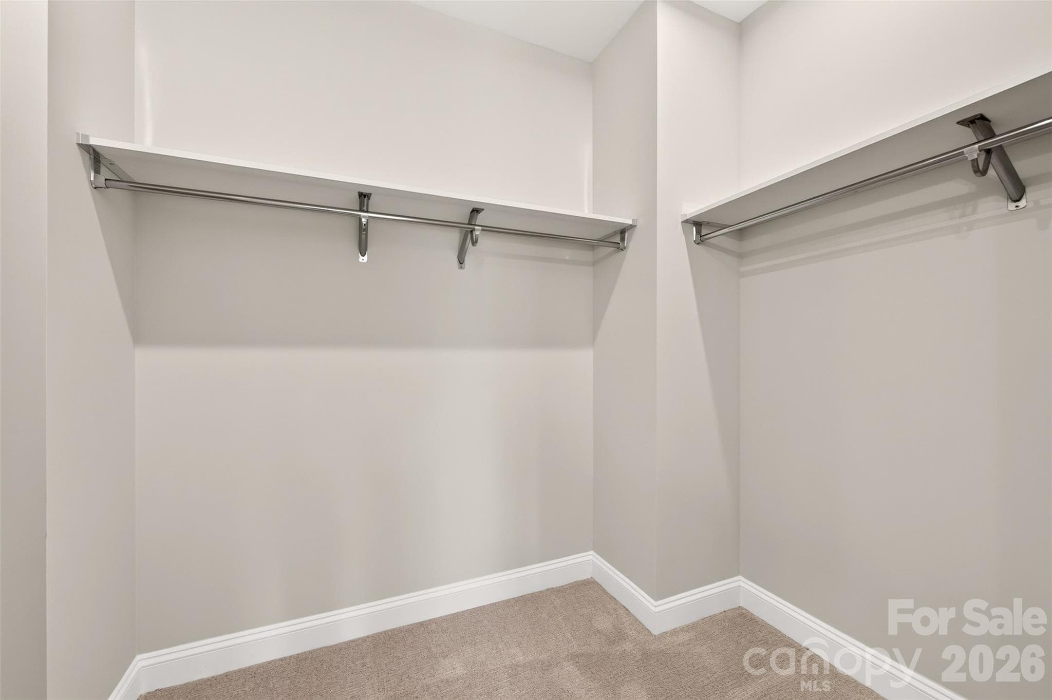 Primary walk-in closet - 411 Old Town Village Road, Waxhaw
