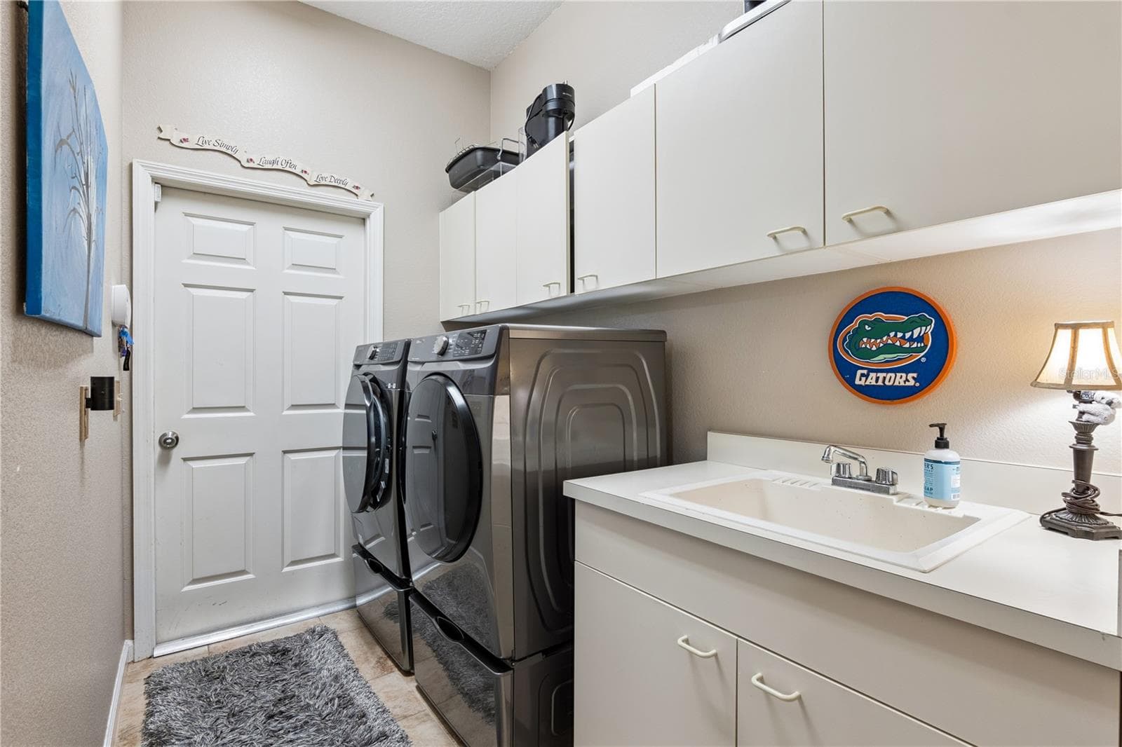 Laundry Room with sink and cabinetry - 635 CHATAS CT, LAKE MARY