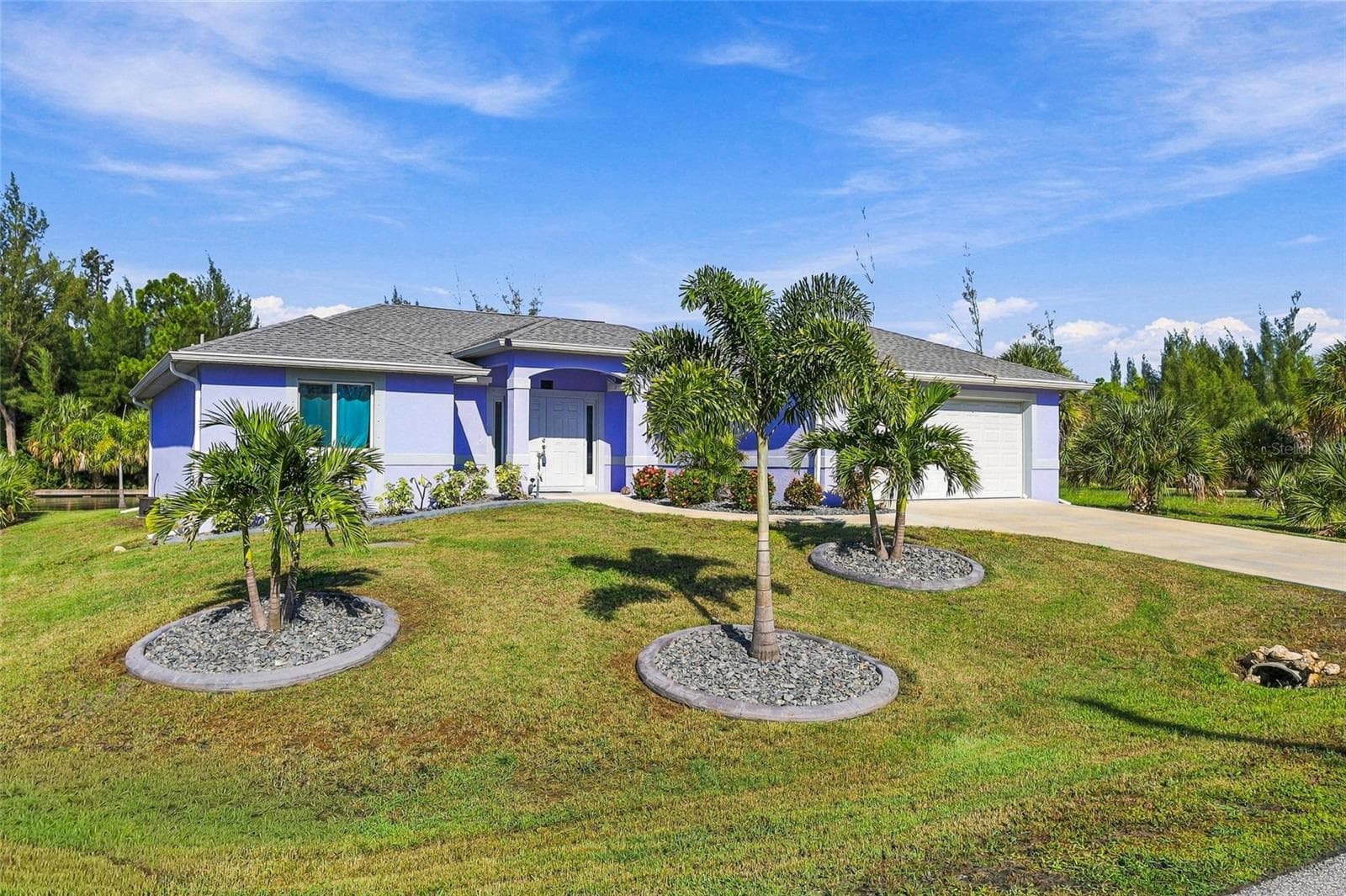 FRONT AND SIDE VIEW - 10554 LIVE OAK RD, PORT CHARLOTTE