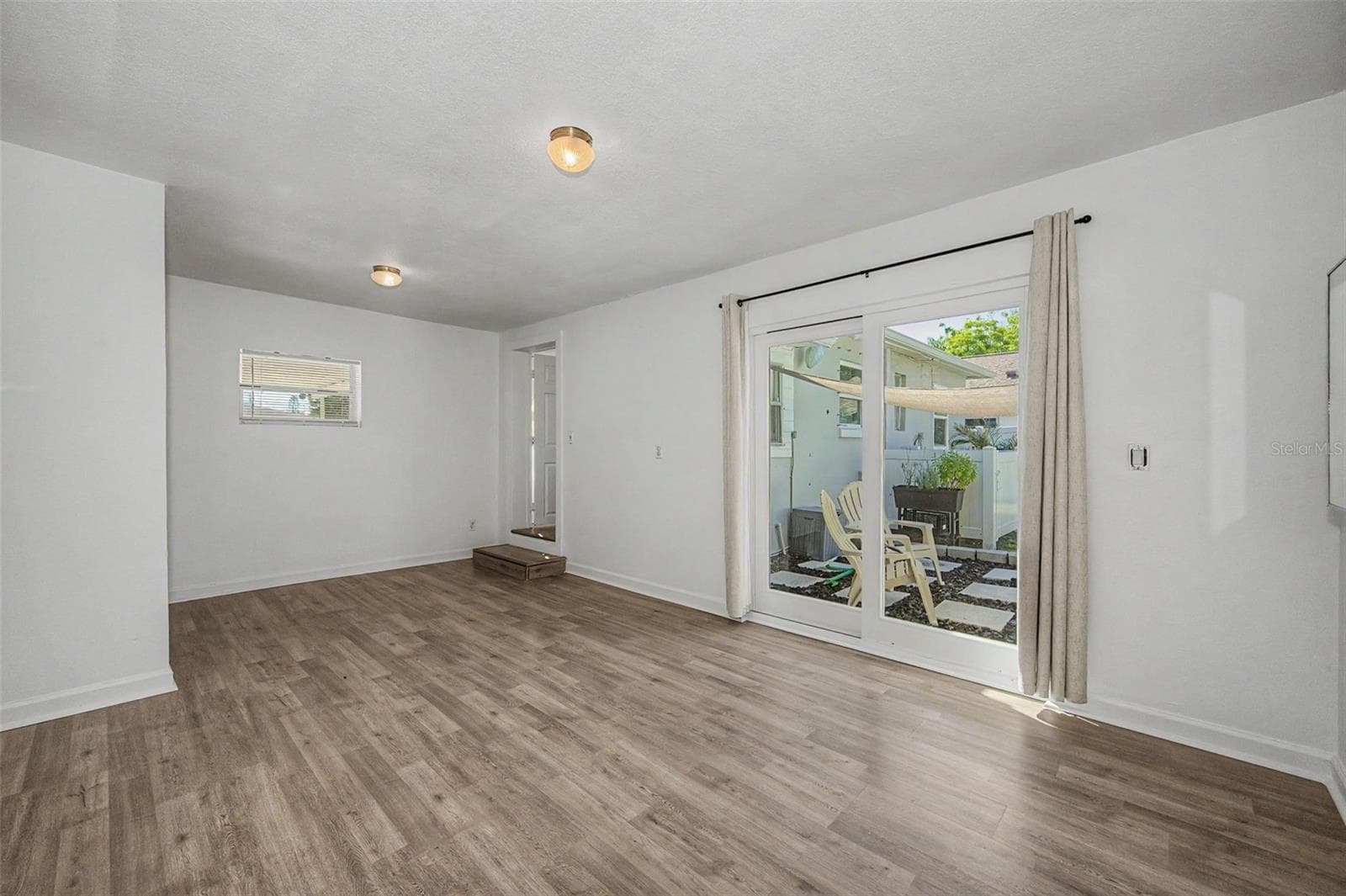 Primary Bedroom with Slider to Outside - 1001 QUEEN ST S, ST PETERSBURG