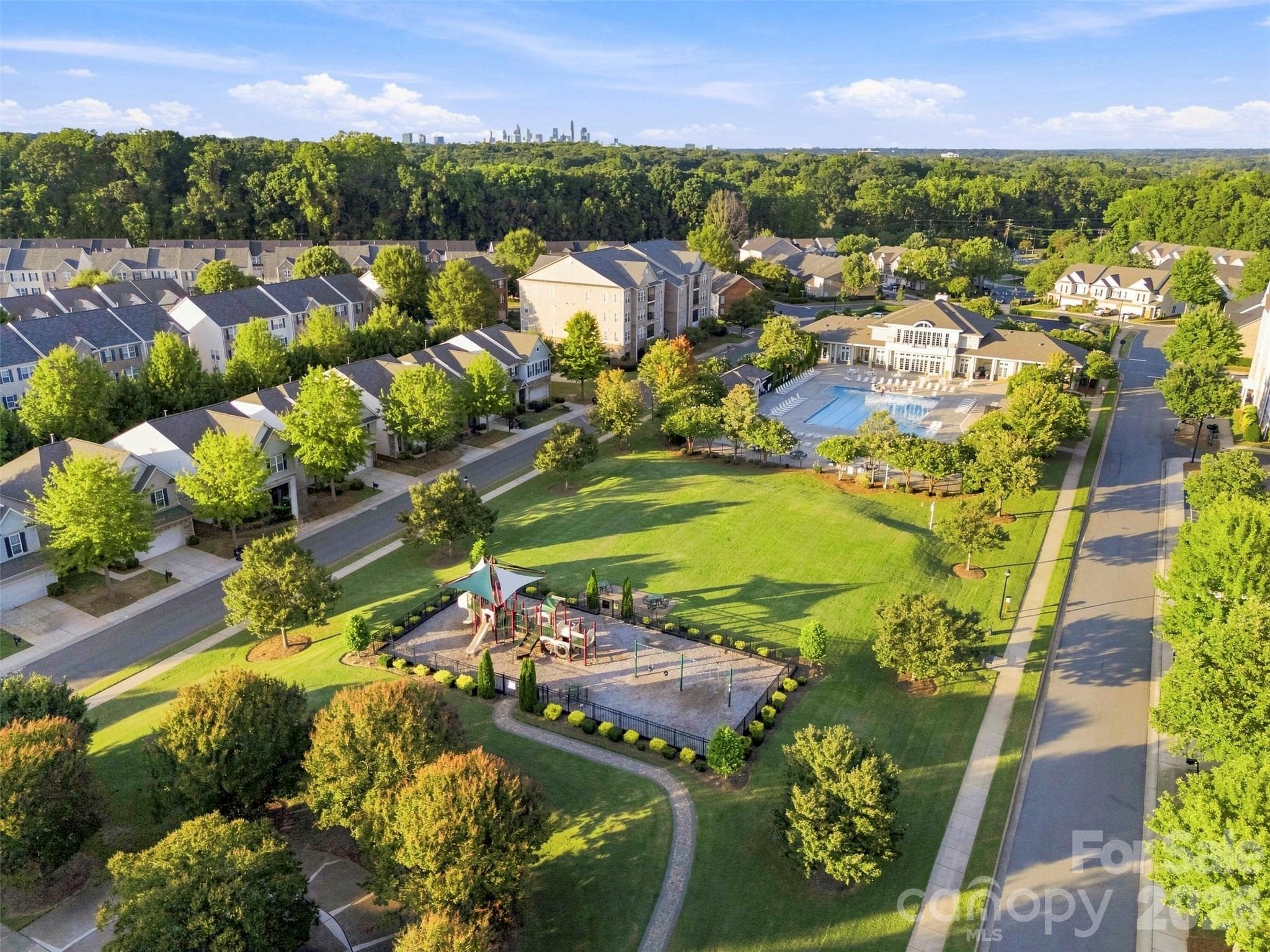 This community offers resort living with all the amenities! Clubhouse, Pool, Playground, Dog park, Fitness center, walking trails and more! - 6605 Central Pacific Avenue, Charlotte