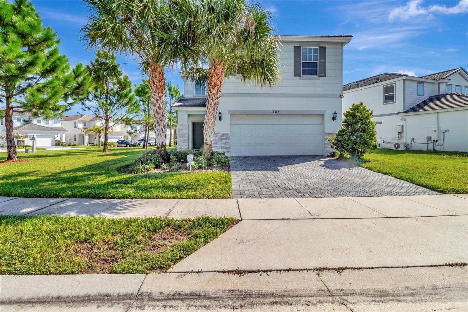 Front Exterior - 7312 OAKMOSS LOOP, DAVENPORT