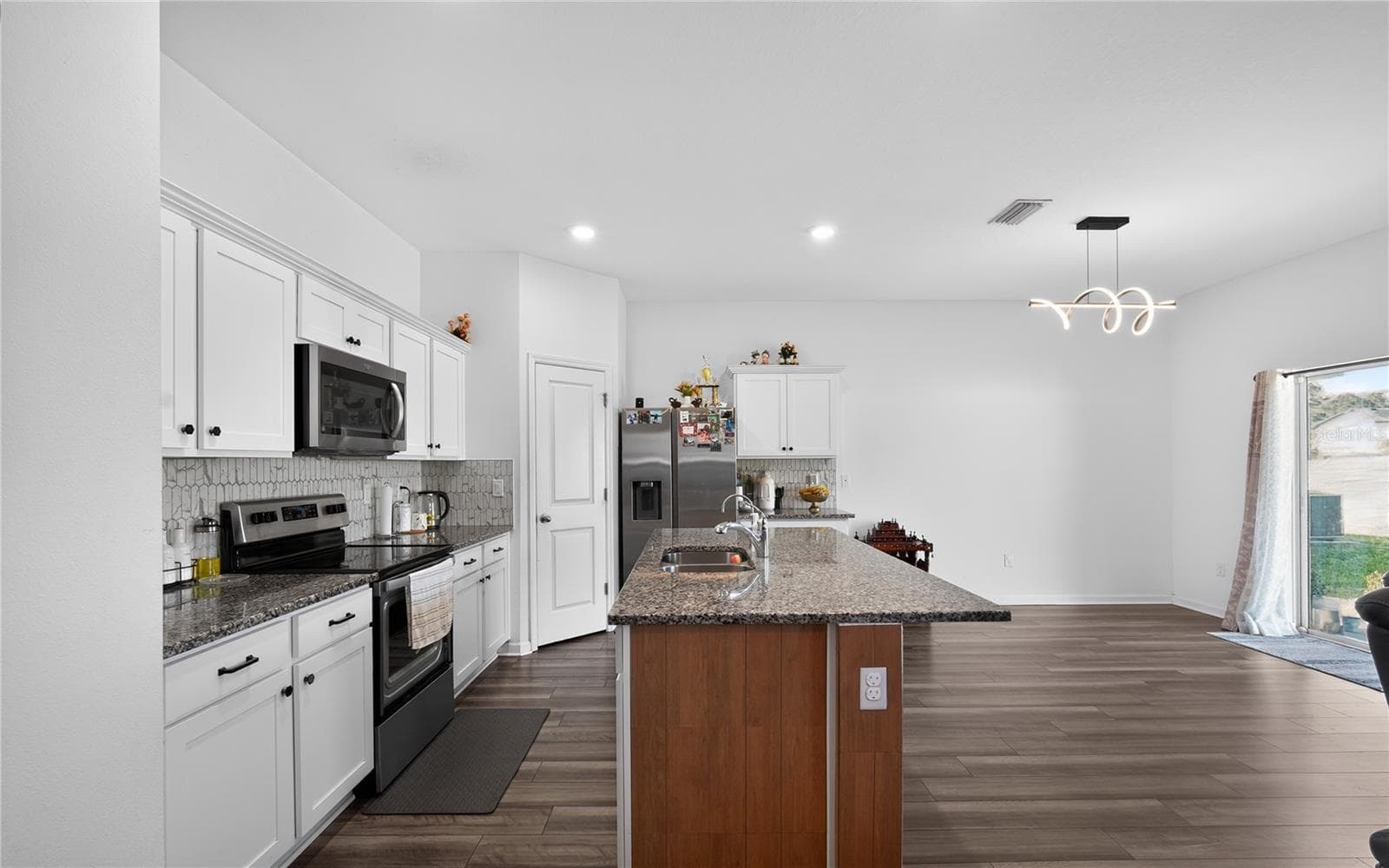 Kitchen and Dining - 35568 SHADE FERN LN, ZEPHYRHILLS