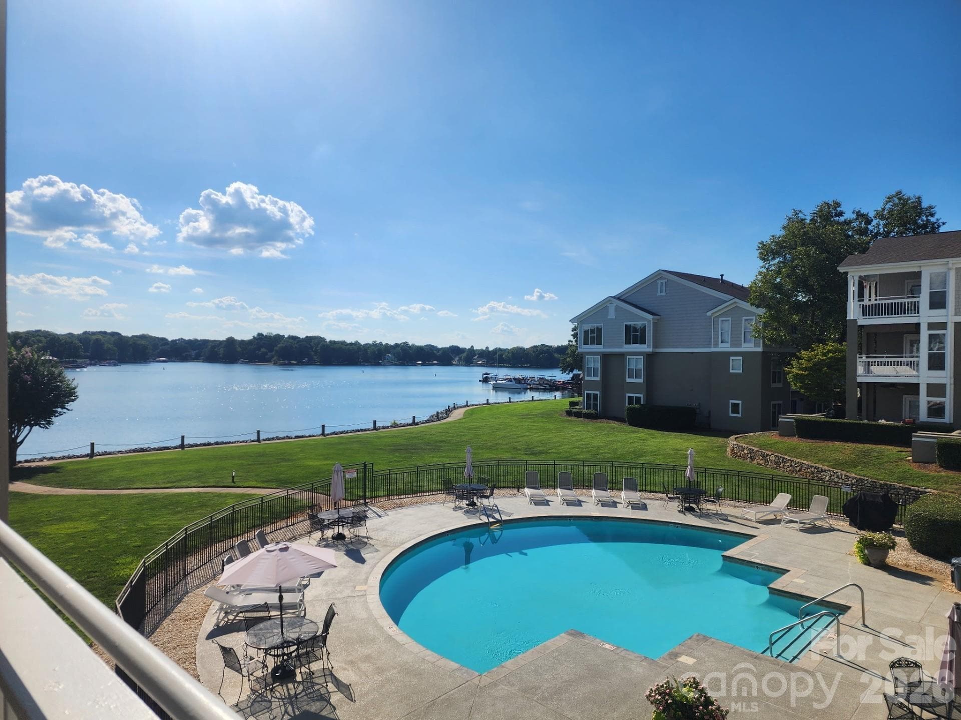 Enjoy the views of Lake Norman and the community pool. - 1332 Torrence Circle, Davidson