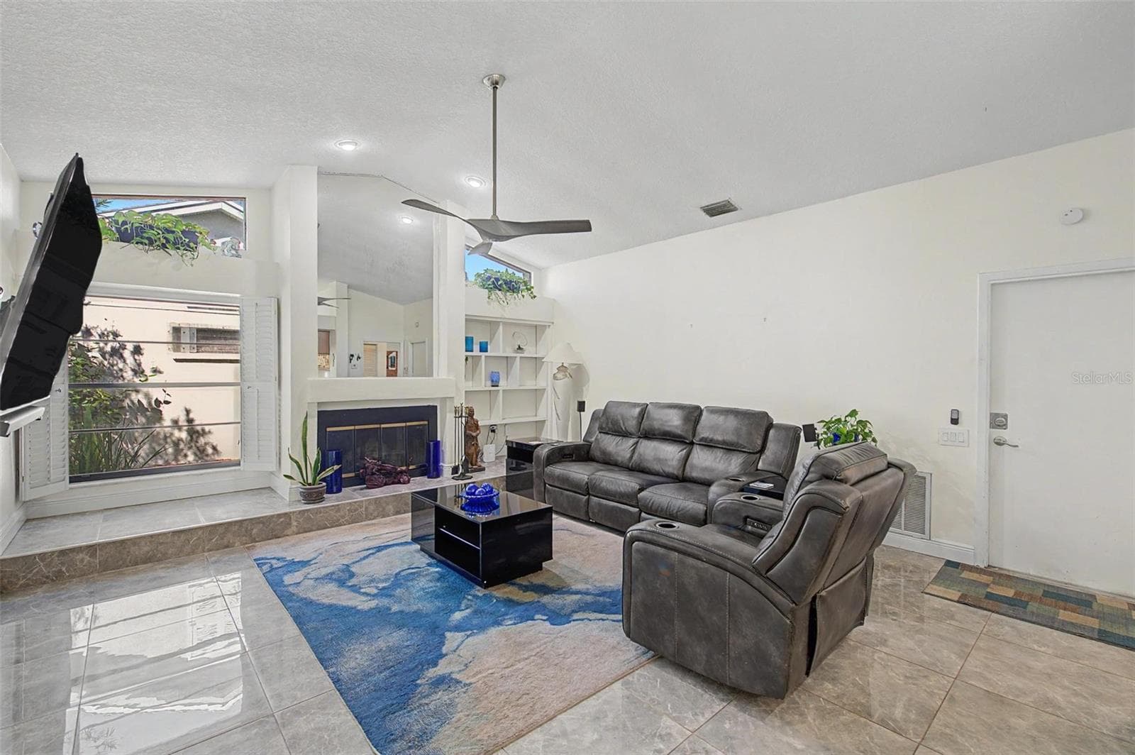 Family room with fireplace - 8612 BRAXTON DR, HUDSON