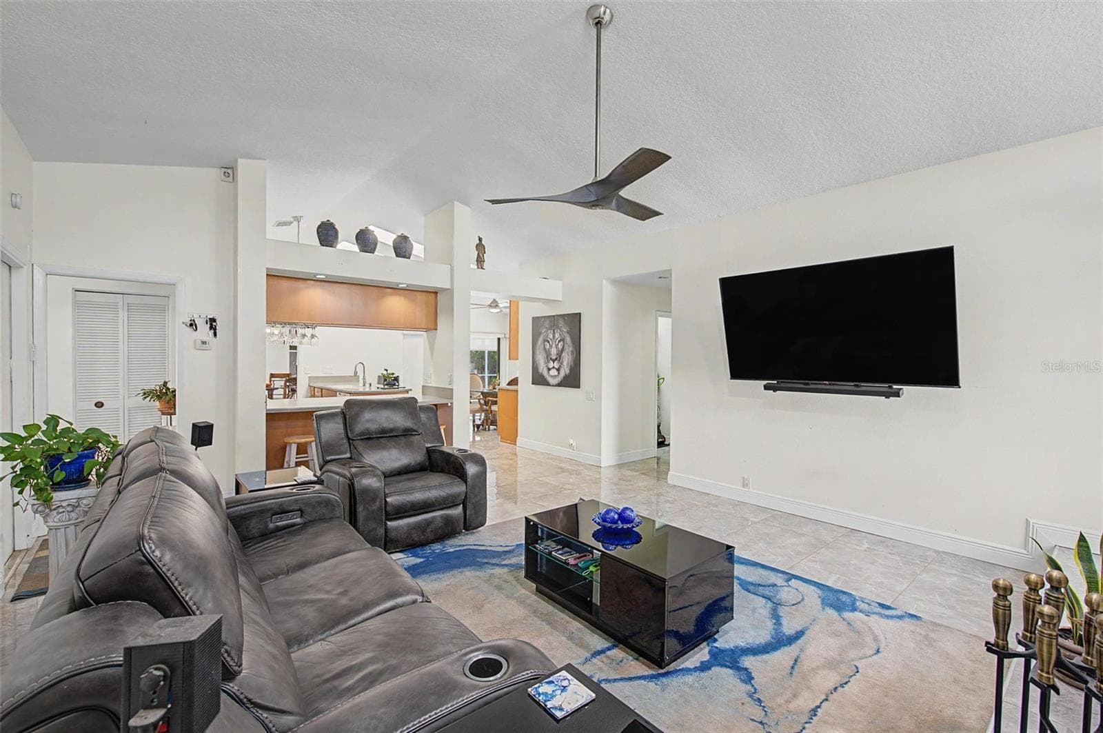 Family room with fireplace - 8612 BRAXTON DR, HUDSON