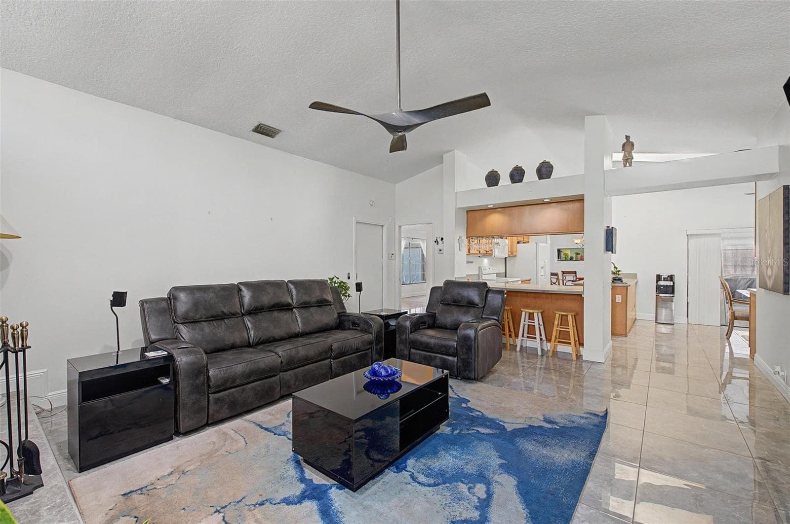 Family room with fireplace - 8612 BRAXTON DR, HUDSON