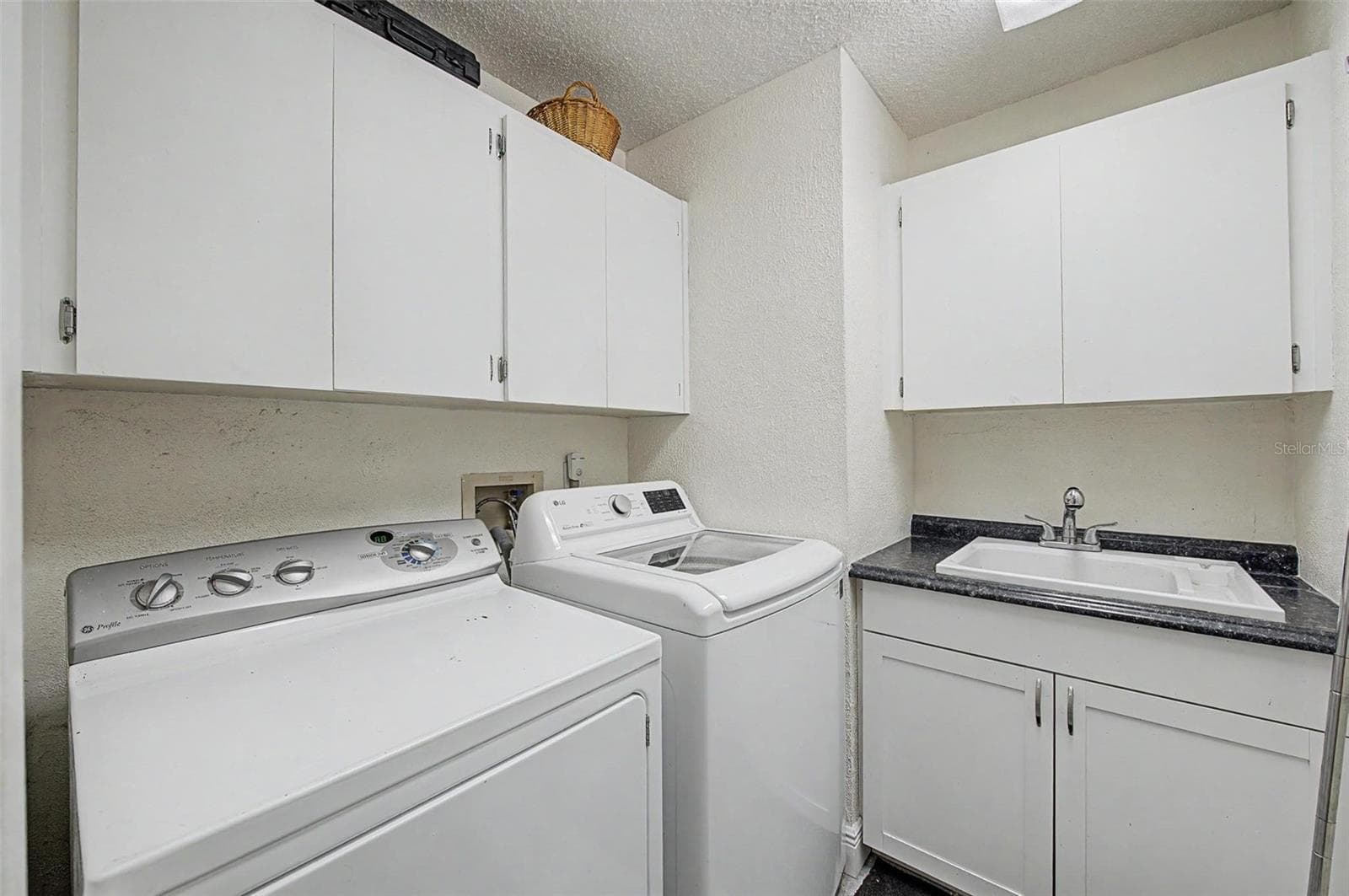 Inside laundry room - 8612 BRAXTON DR, HUDSON