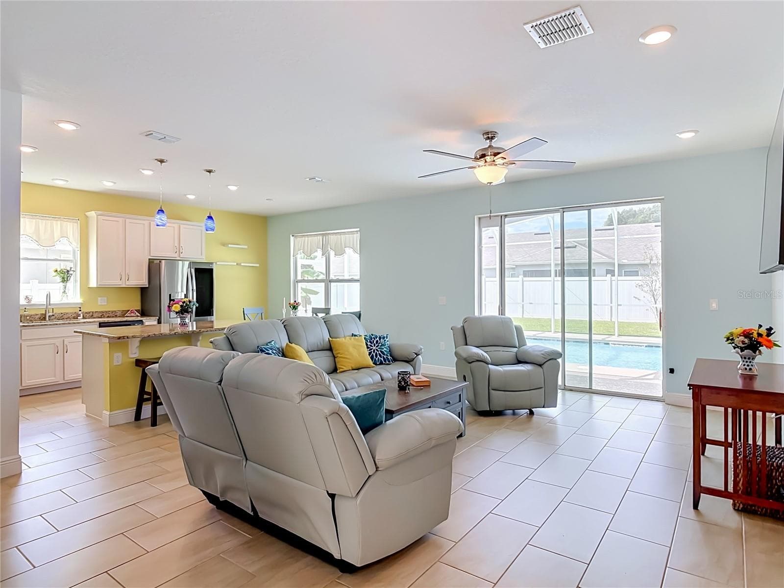 Living room sliders to lanai and pool with pet door - 1611 LADY FERN TRL, DELAND