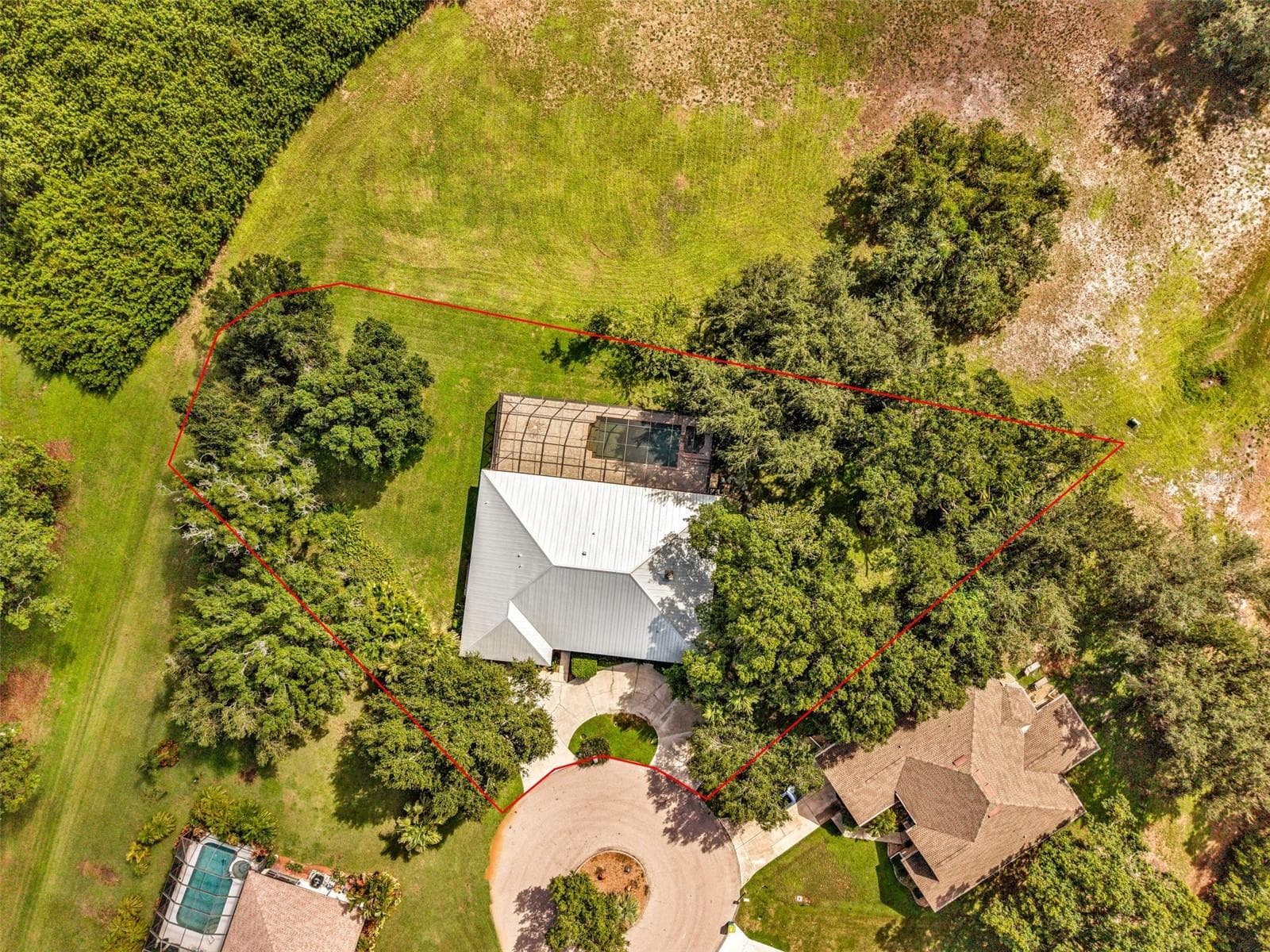 Almost 6/10 of an acre - 26212 MADRAS CT, PUNTA GORDA