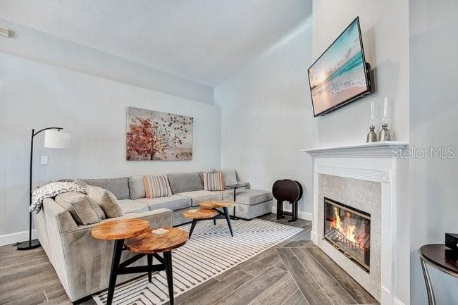 LIVING ROOM AND FIREPLACE - 650 REGINA LN, LAKE MARY
